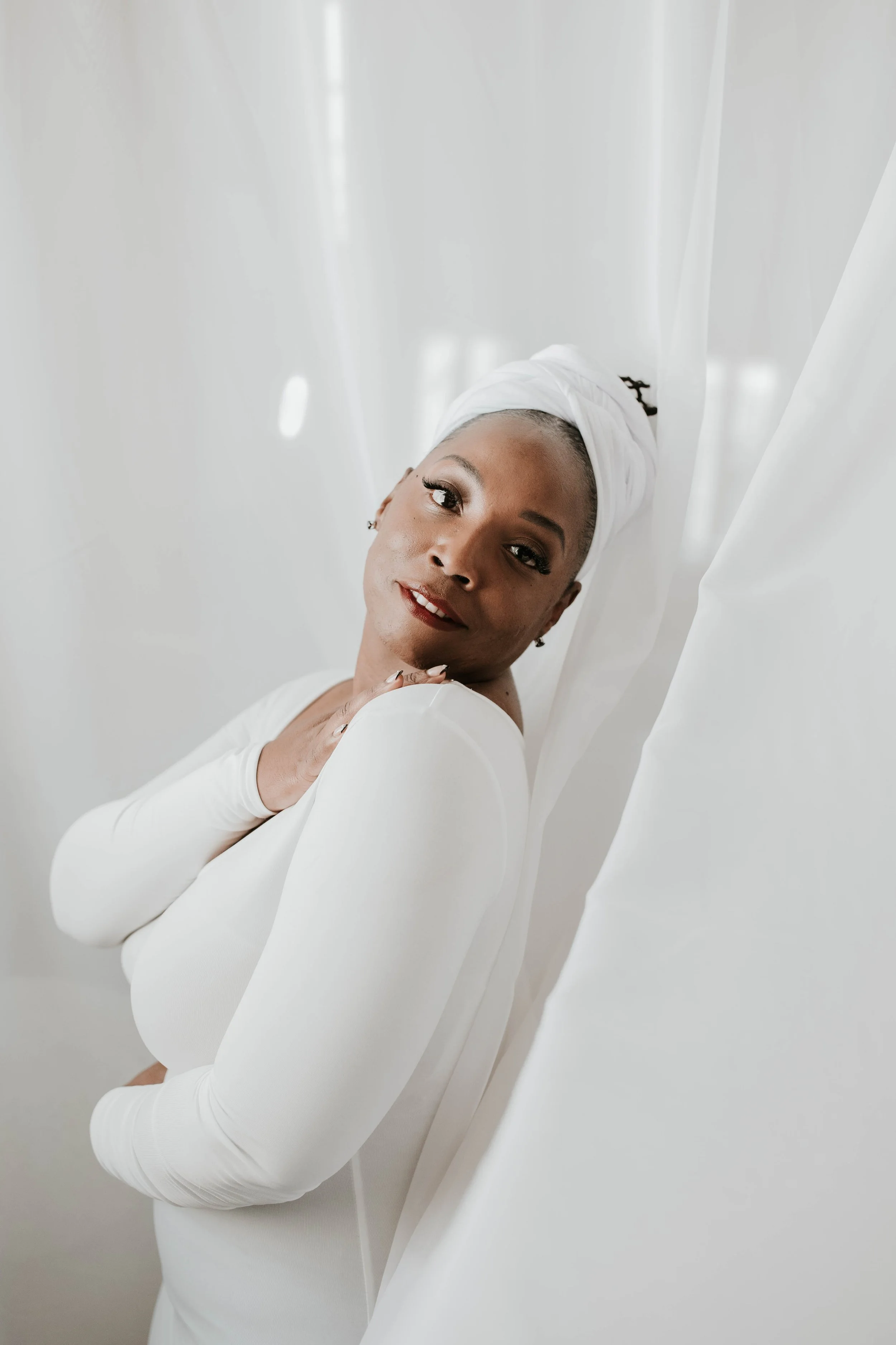 Towanda Carrigan in a reflective portrait representing self-awareness, alignment, and purpose-driven leadership through the 2Wanda Community Foundation