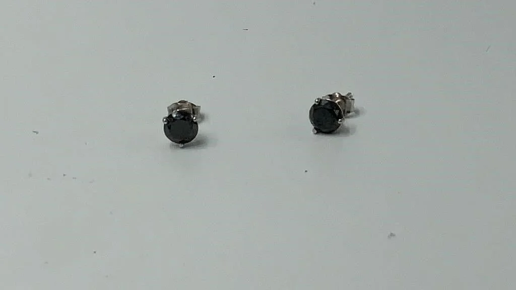 💎 Bold. Chic. Unforgettable. 💎

Today&rsquo;s featured auction piece: Black diamond stud earrings&mdash;a modern statement of elegance and edge. These sleek, shimmering stones catch the light with every movement, making them the perfect accessory f