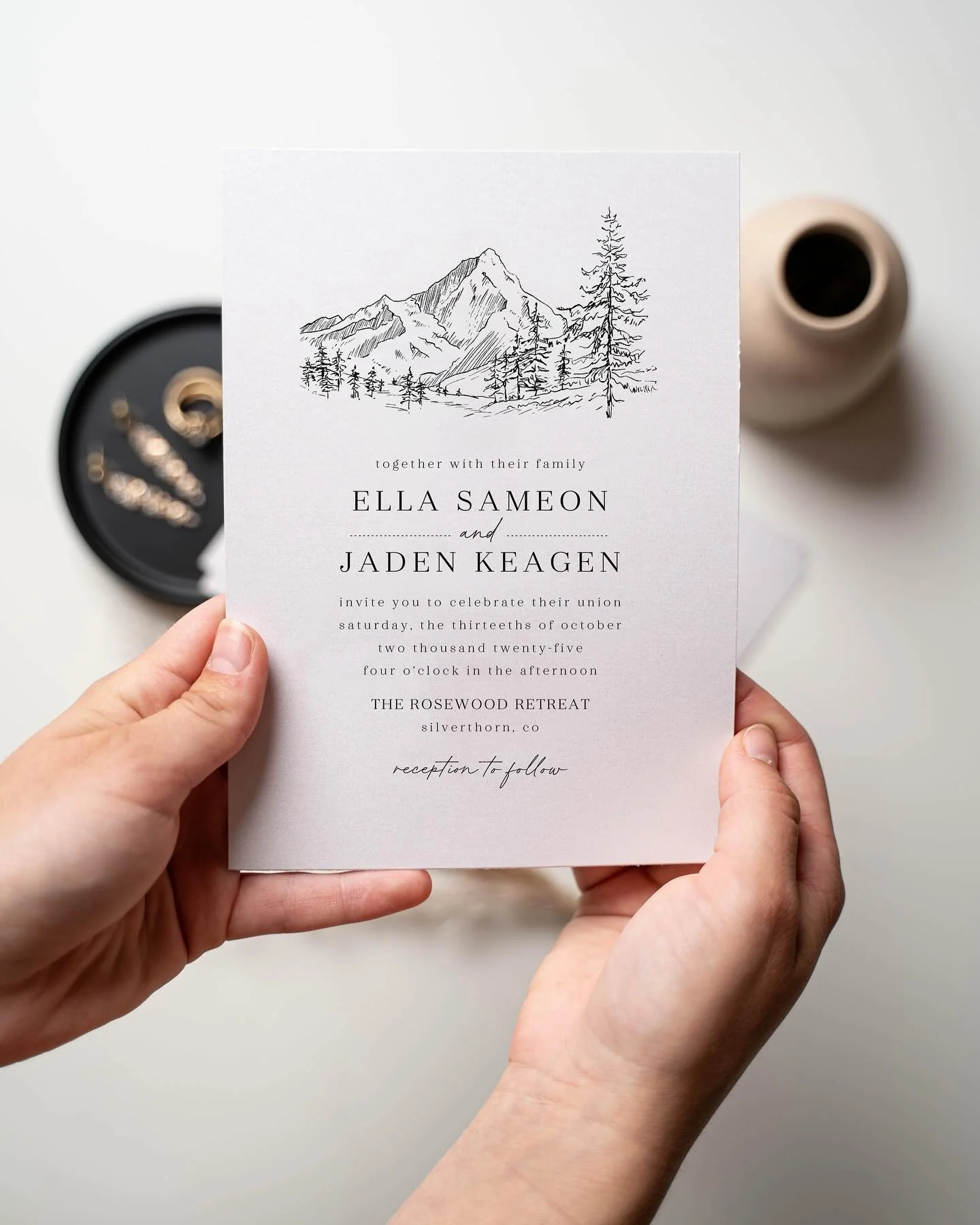 Pick a wedding invitation that tells your guests the wedding vibe! For this invitation suite, I hand drew a mountain landscape. Which is perfect for couples who love the outdoors or are getting married in the mountains or pine forests. 

#weddingvibe