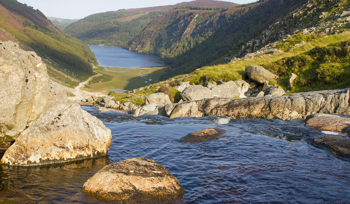 Rushing rivers in the Wicklow/Glendalough mountains. Hills and mountains are seen in the background