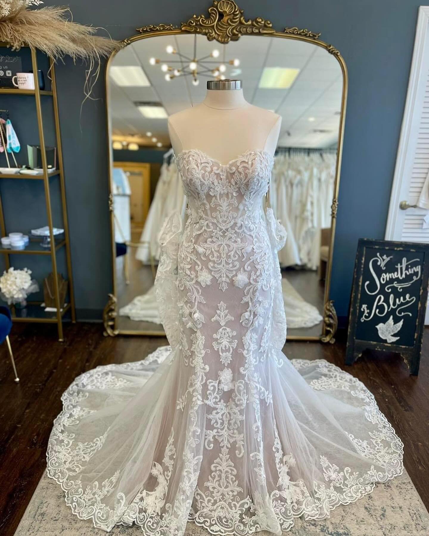 A wedding dress with detached accessories? Yes, please! 🤍

This week&rsquo;s pick for #WeddingGownWednesday is a strapless, fitted gown covered in intricate lace and fun 3D floral details!  We are loving the detached long sleeves that you can throw 