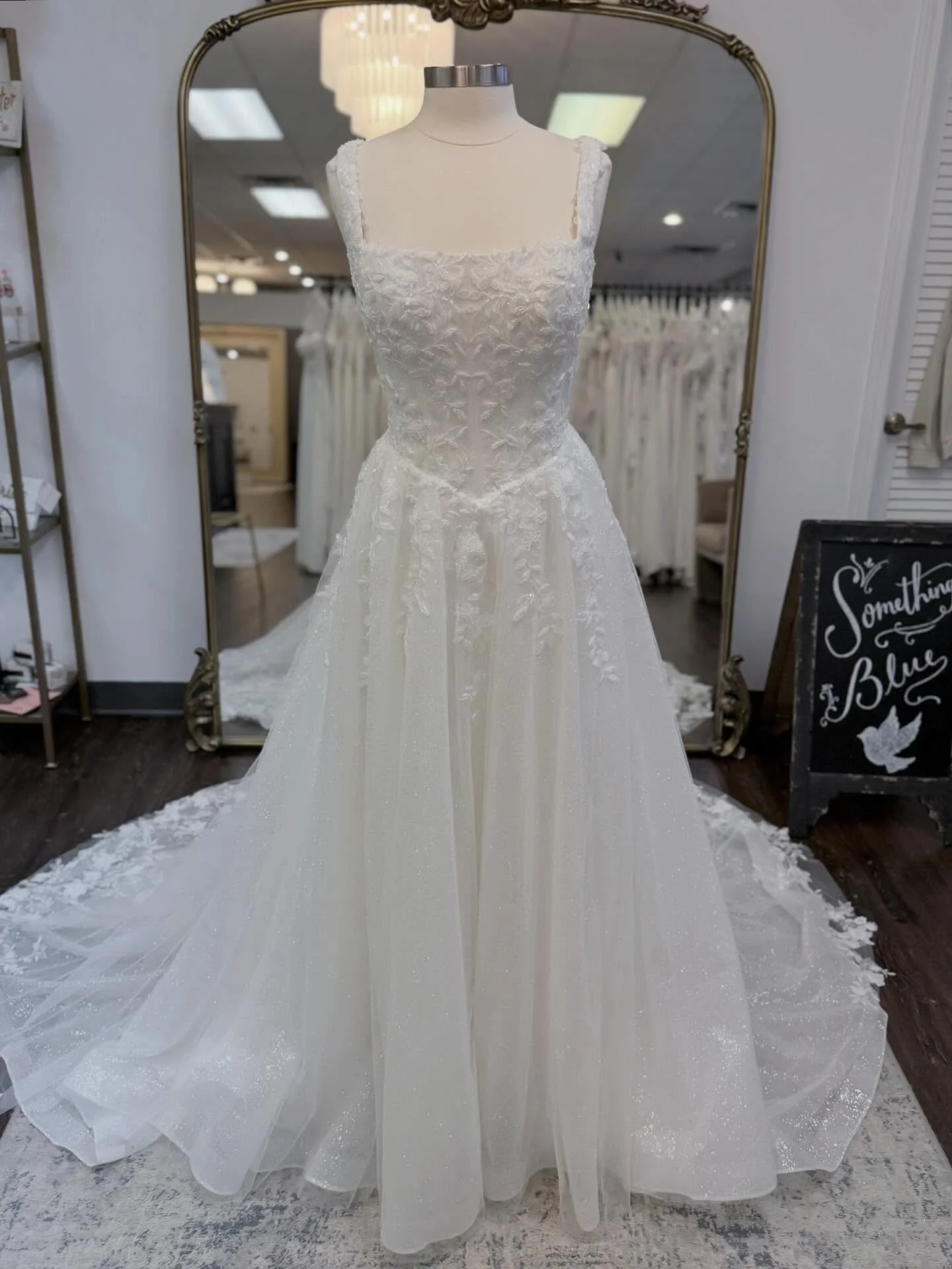 Kissing 2025 goodbye with one sparkly gown! 💋 

This gorgeous a-line features a square neckline, basque waist and sparkles for DAYS! ✨

Designer: @madilanebridal 

#weddinggownwednesday #somethingbluebridal 

New Years Eve Wedding &bull; Wedding Gow