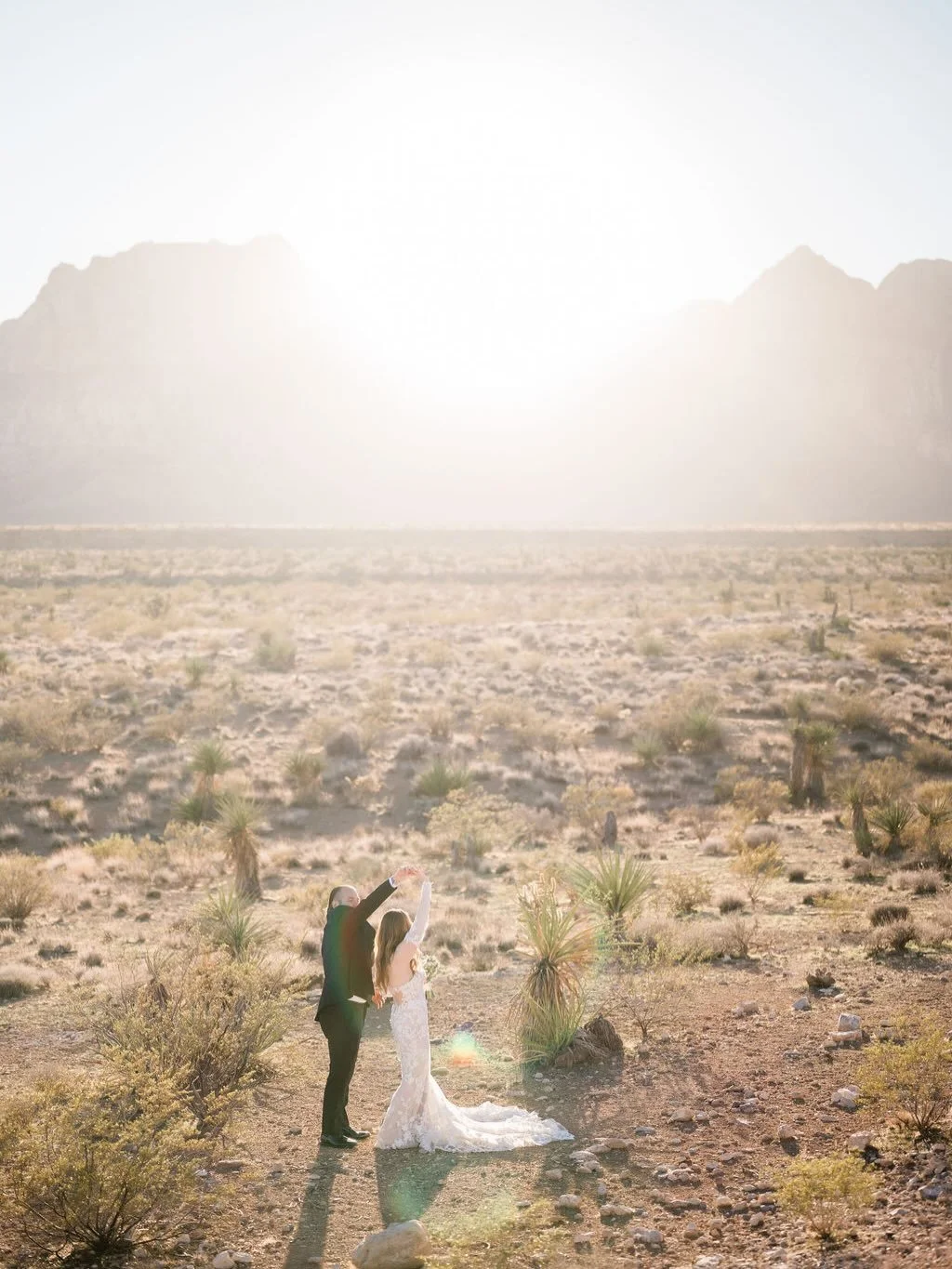 Desert heat, bridal energy 🤍🌵

Amanda + Nick&rsquo;s Vegas wedding was absolutely stunning - especially her @madilanebridal gown!✨

#somethingbluebridal #desertwedding

Wedding: @cactuscollectiveweddings