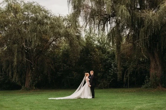 On the blog this week: Jenna &amp; Colin&rsquo;s beautiful big day!🤍

Dress + Veil: Emilia Leray Private Collection from @theone_sbb 
Photography: @nikkilizphotography 
Venue: @riverpointecc
Floral: @scherervilleflorist 
Cake &amp; Desserts: @marily