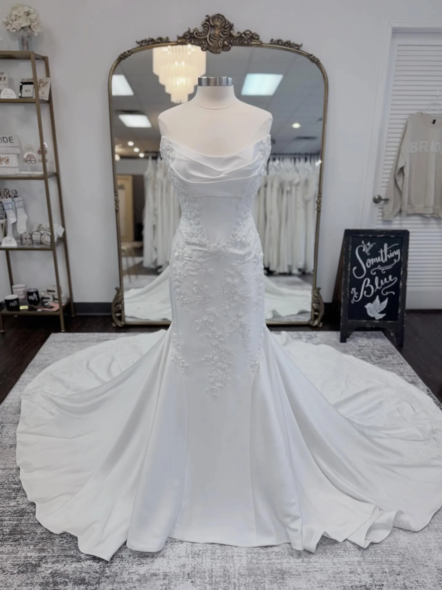 Sculpted satin, dreamy lace, and a train made for a dramatic entrance 🤍 Available at your fave bridal boutique 💁🏻&zwj;♀️

Designer: @maggiesotterodesigns 

#weddinggownwednesday #somethingbluebridal 

Wedding &bull; Dress Shopping &bull; Classic L