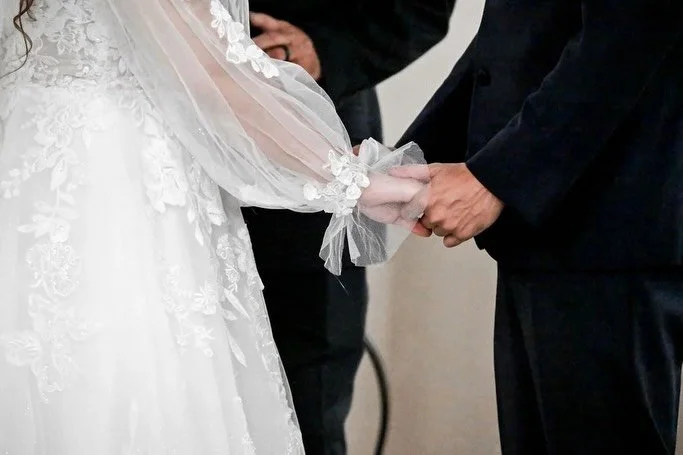 On the blog: Makayla &amp; Scott&rsquo;s beautiful big day!🤍

Dress &amp; Sleeves: @essenseofaustralia from Something Blue Bridal
Photography: @aliandarielphotoco 
Venue: Zion Holiness Pentecostal Church in Portage
Cake: @marilynsbakery 
Hair: Bride