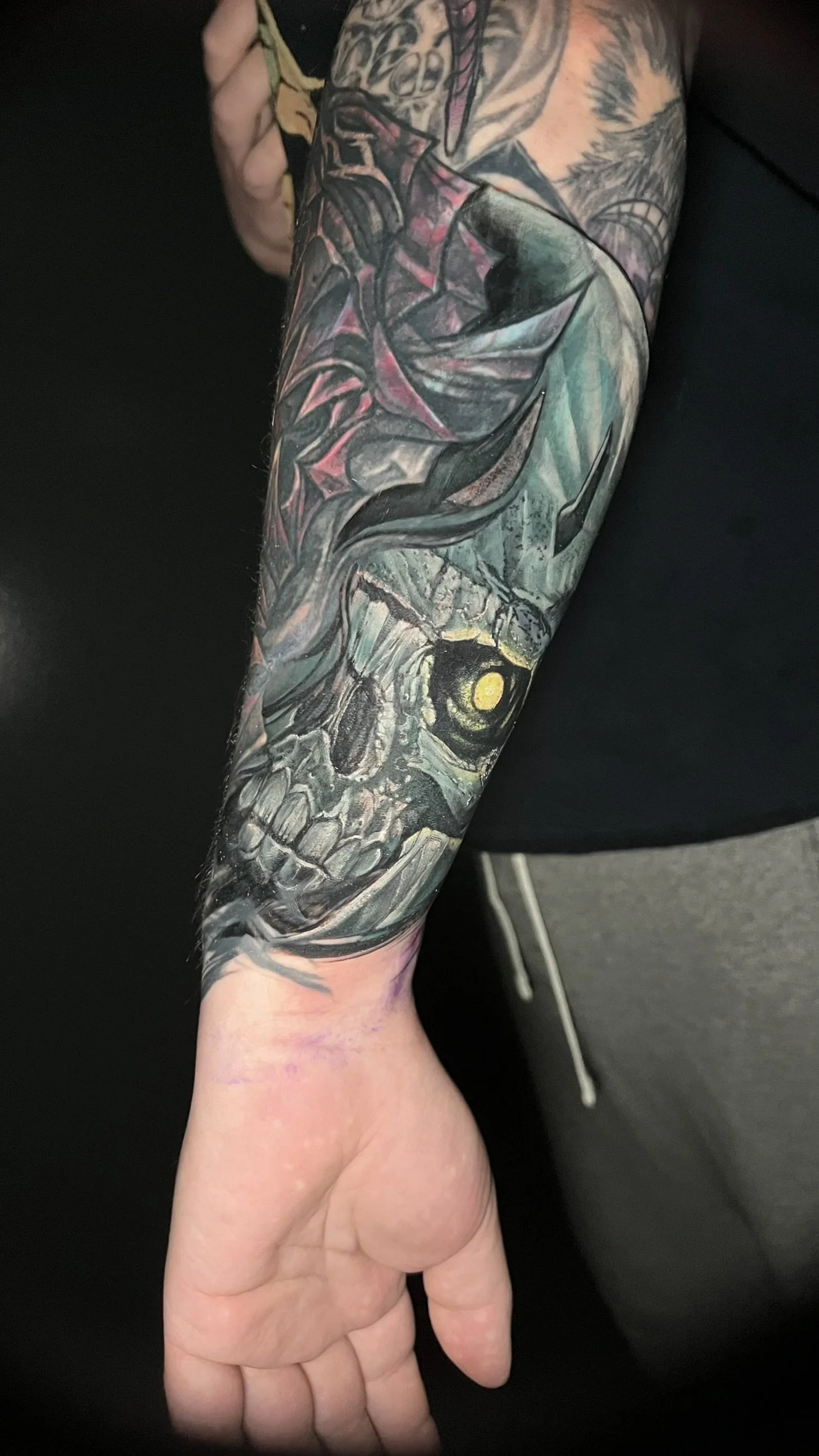 full colro saturated coverup anime tattoo of skull knight from berserk done on the arm by sterling gorejus at easy tiger tattoo in merrillville indiana