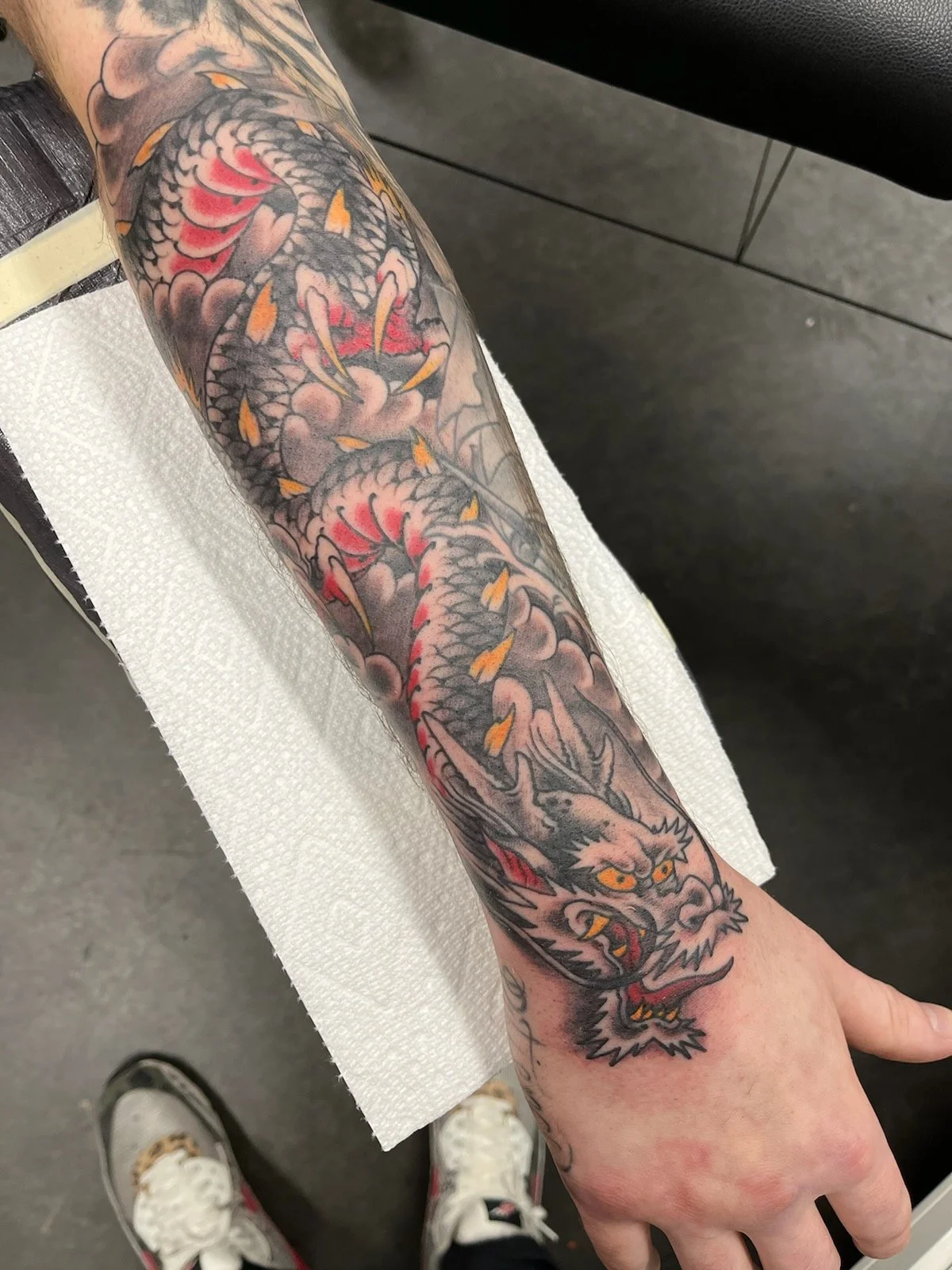 traditional japanese dragon tattoo done by cody wallenius at easy tiger tattoo in merrillville indiana