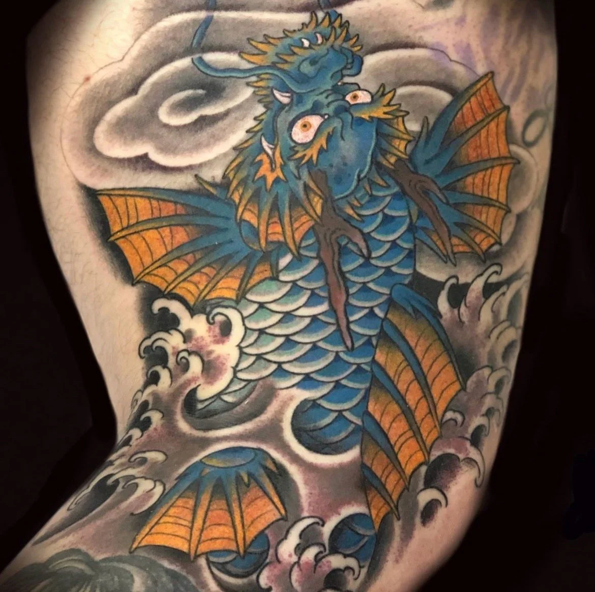traditional colored dragon kio done by cody wallenius at easy tiger tattoo in merrillville indiana