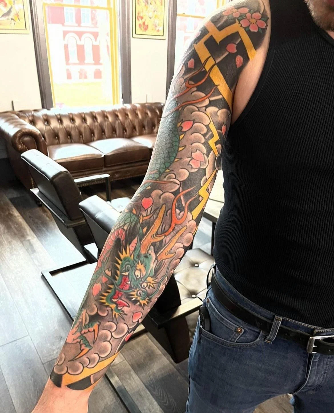 japanese traditional colored dragon sleeve done by cody wallenius at easy tiger tattoo in merrillville indiana