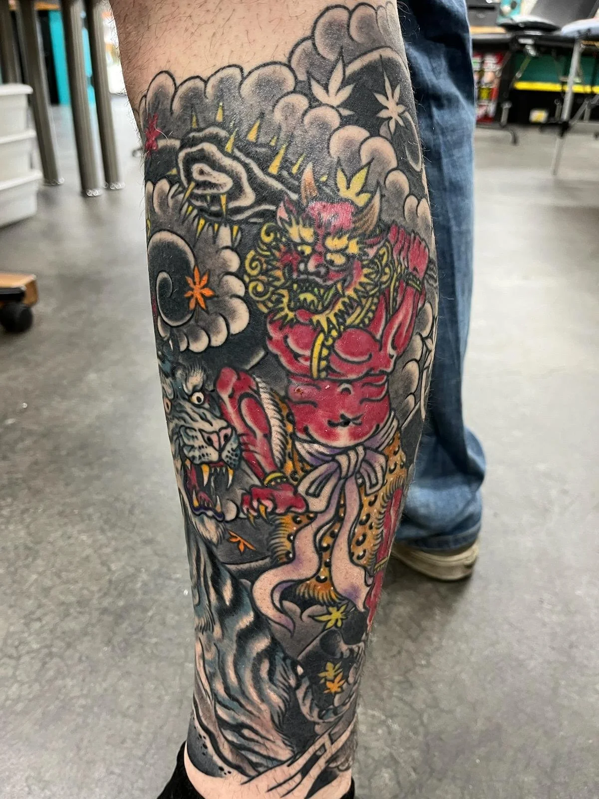 Japanese Traditaional Oni about to Starch a Tiger Tattooed by Cody Wallenius at easy tiger tattoo in Merrillville Indiana