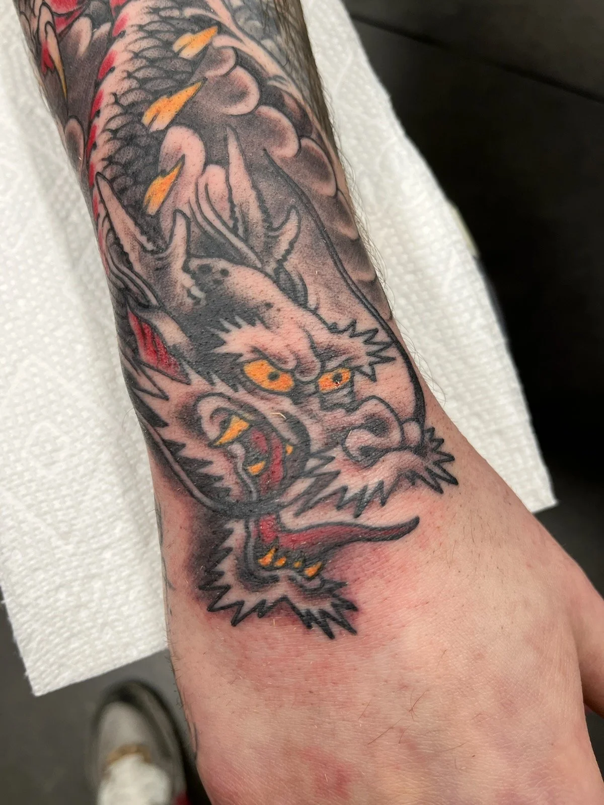 black and grey Japanese Traditional Dragon with color Tattooed by Cody Wallenius at easy tiger tattoo in Merrillville Indiana