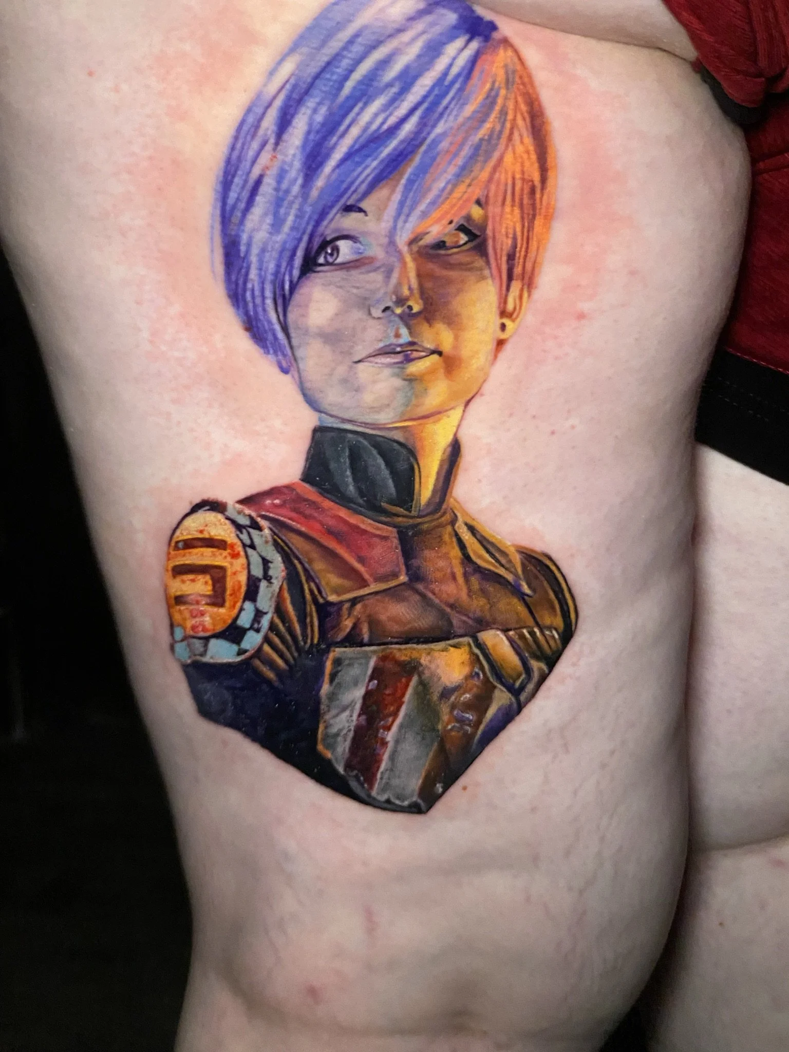 fill color portrait of star wars character sabine wren done on the leg by sterling gorejus at easy tiger tattoo studio in merrillville indiana
