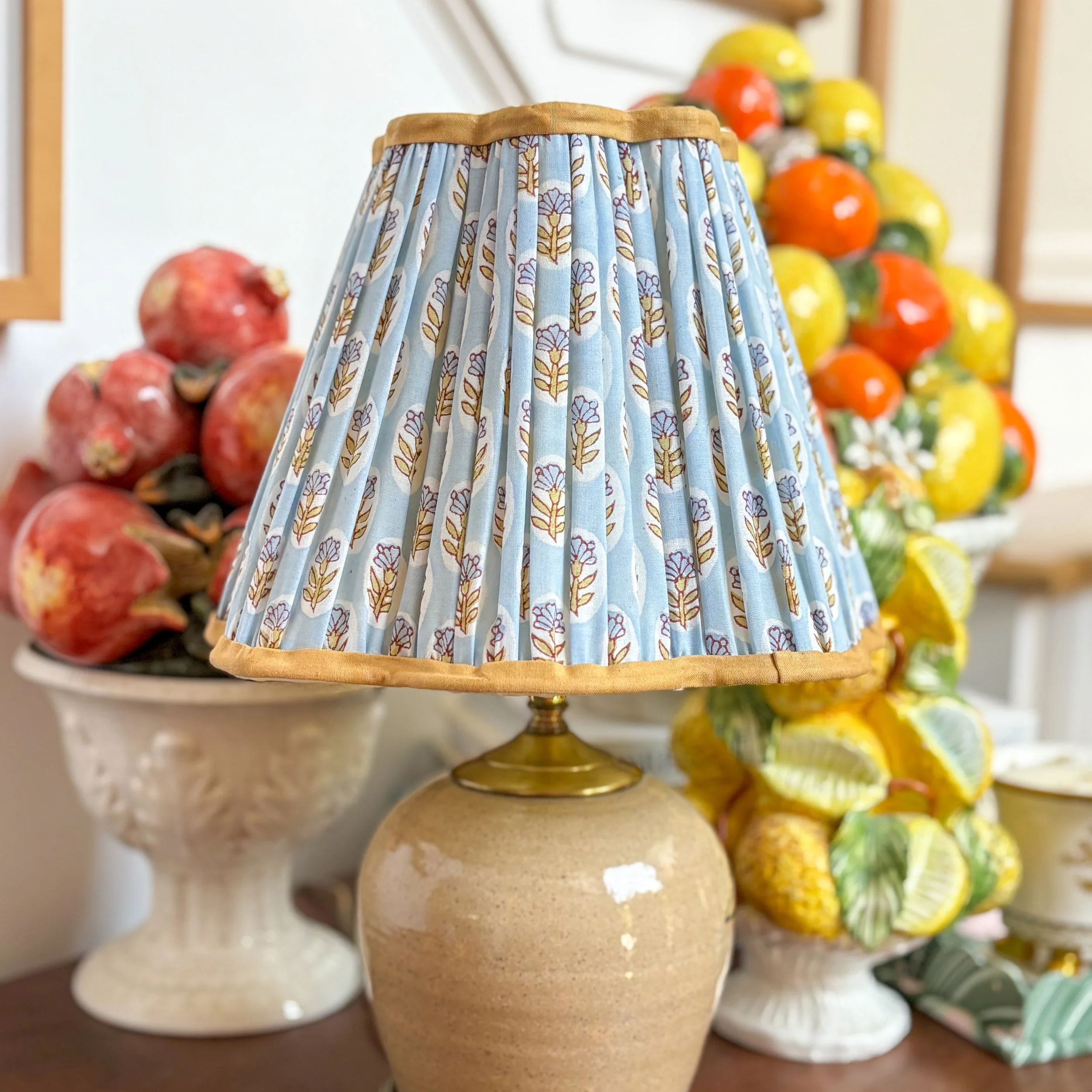Pleated blue floral empire lampshade featuring a scalloped edge