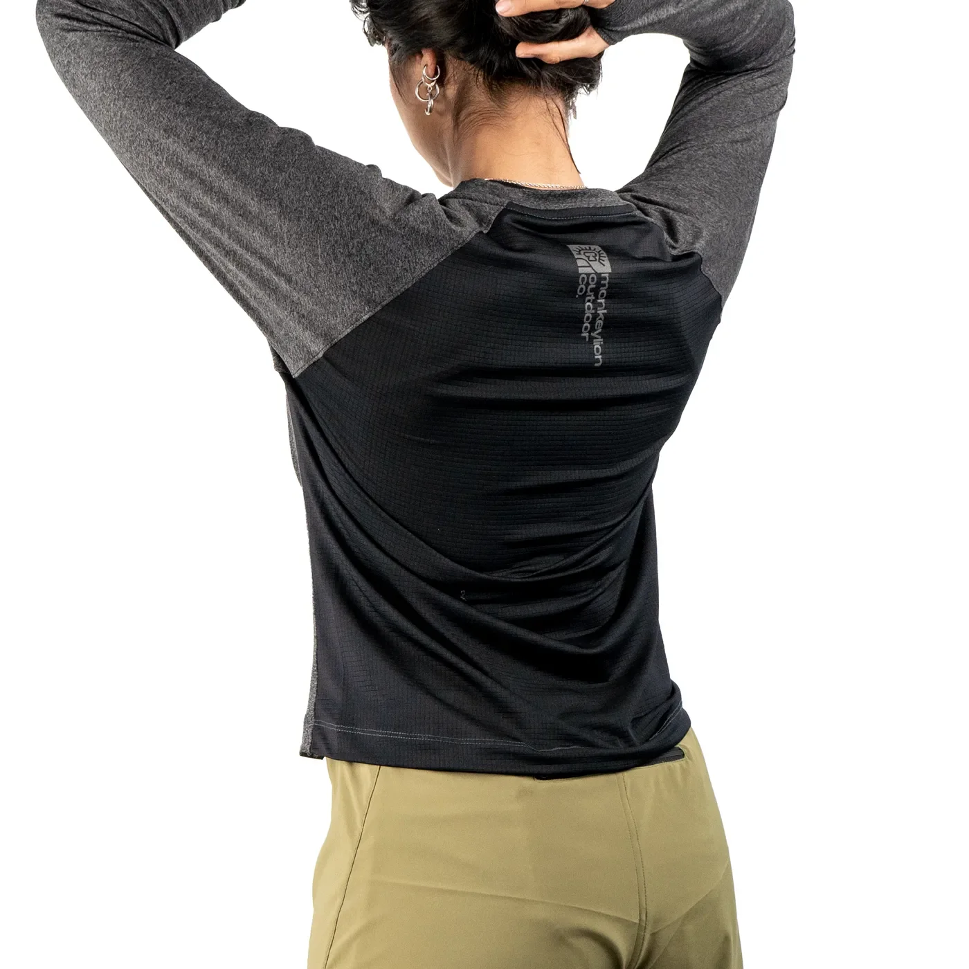 jersey-runner-green-women-monkeylion-model-back.webp