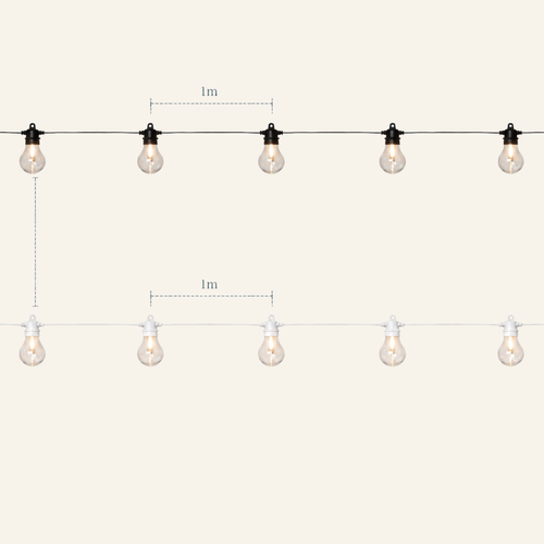 Festoon lighting inside clear-roof marquee