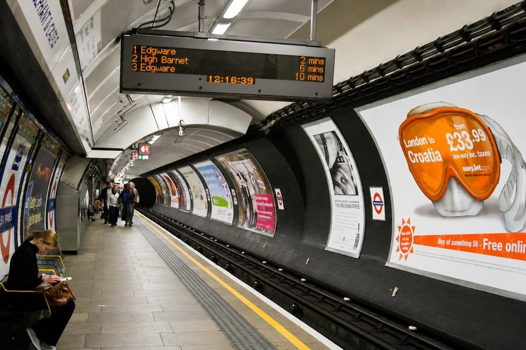Digital Screens vs Posters in Train Stations
