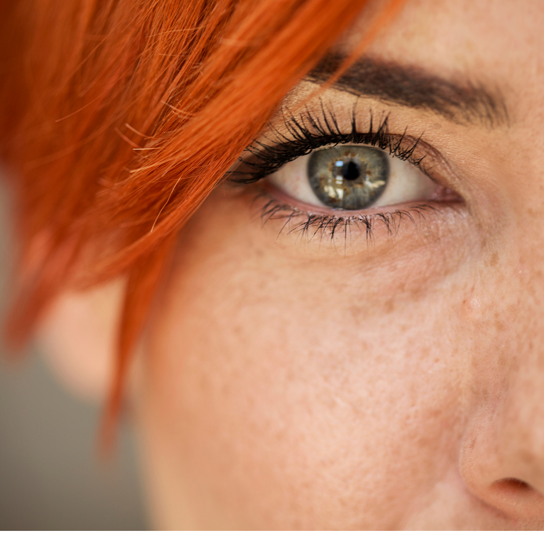 lose-up of a woman's green eye, representing EMDR therapy at Reclaim Therapy in Horsham, PA.