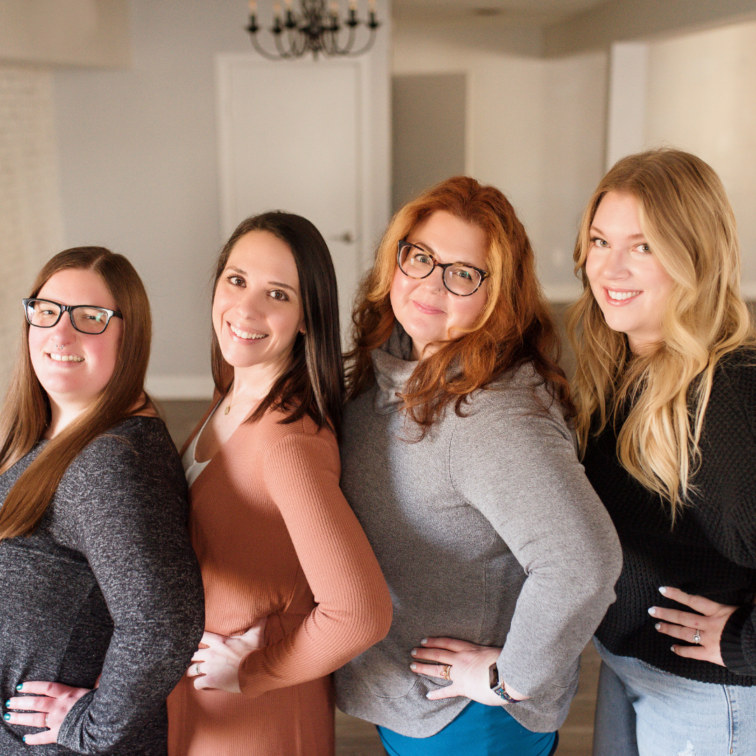 The team of Reclaim Therapy stands together while smiling at the camera. Learn how our team can offer a binge eating support group in Pennsylvania by getting in contacting with an online therapist in Pennsylvania or searching “binge eating groups nea