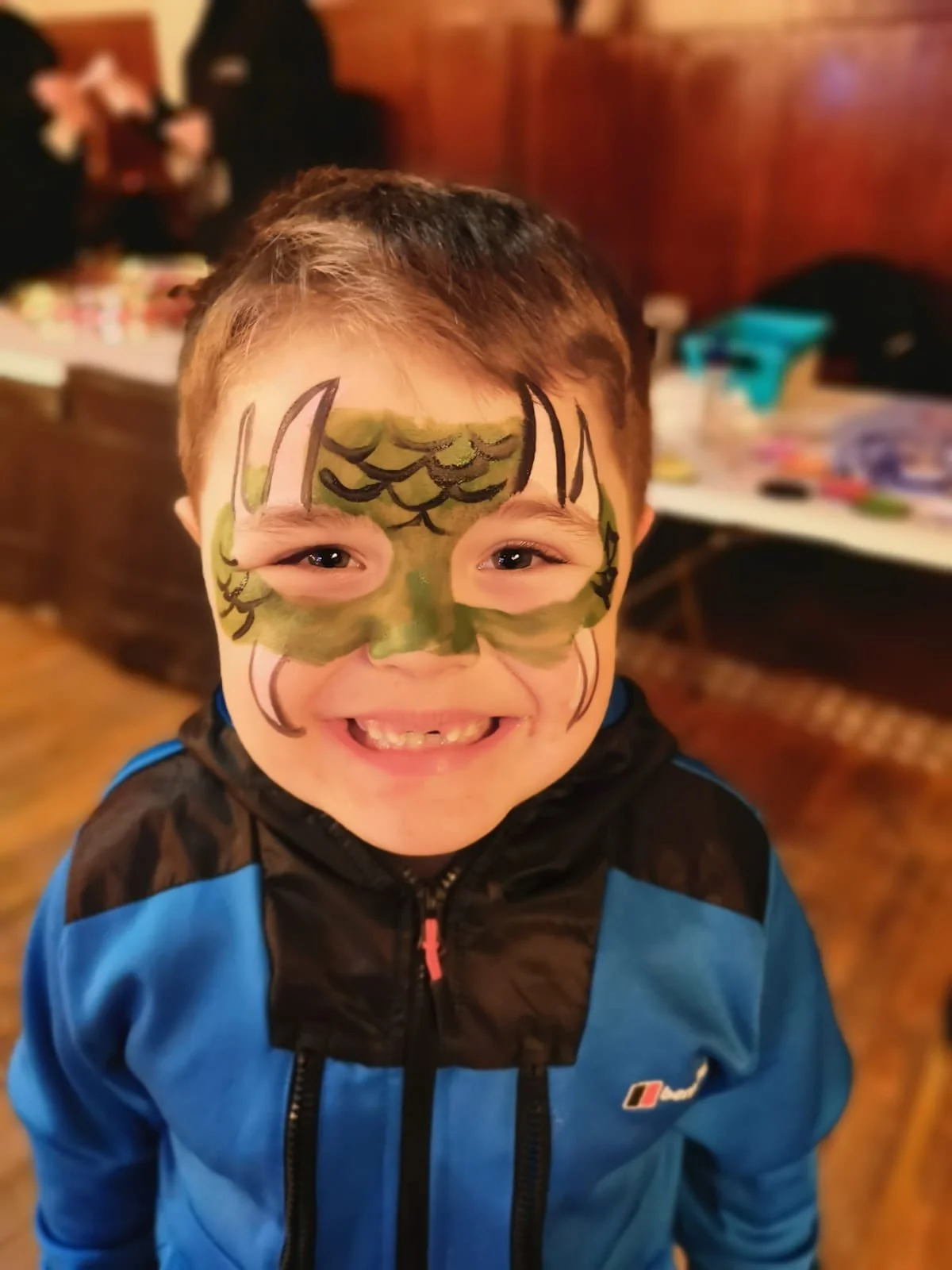 Smiling kid with face paint