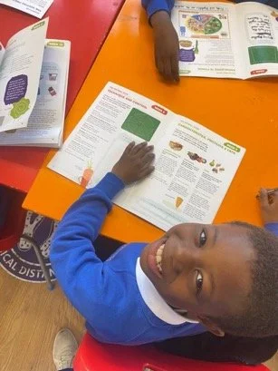Boy at desk in school