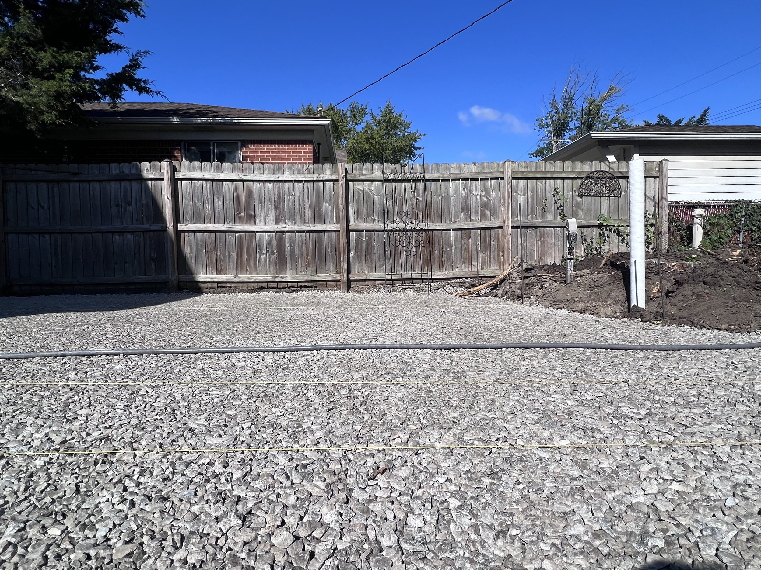 Flat, perfectly level gravel base for brick pavers.