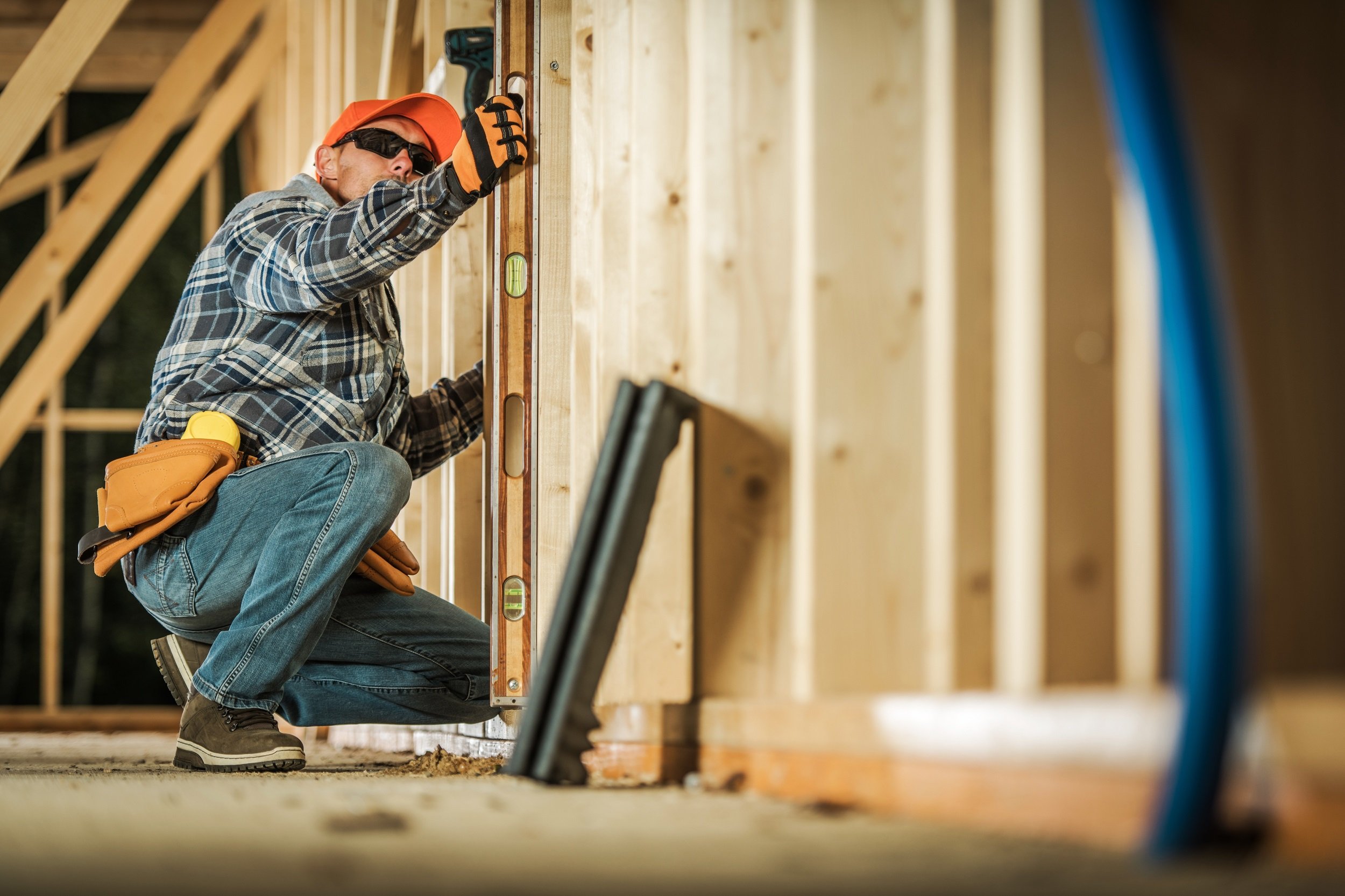 Carpenter framing a house.jpeg