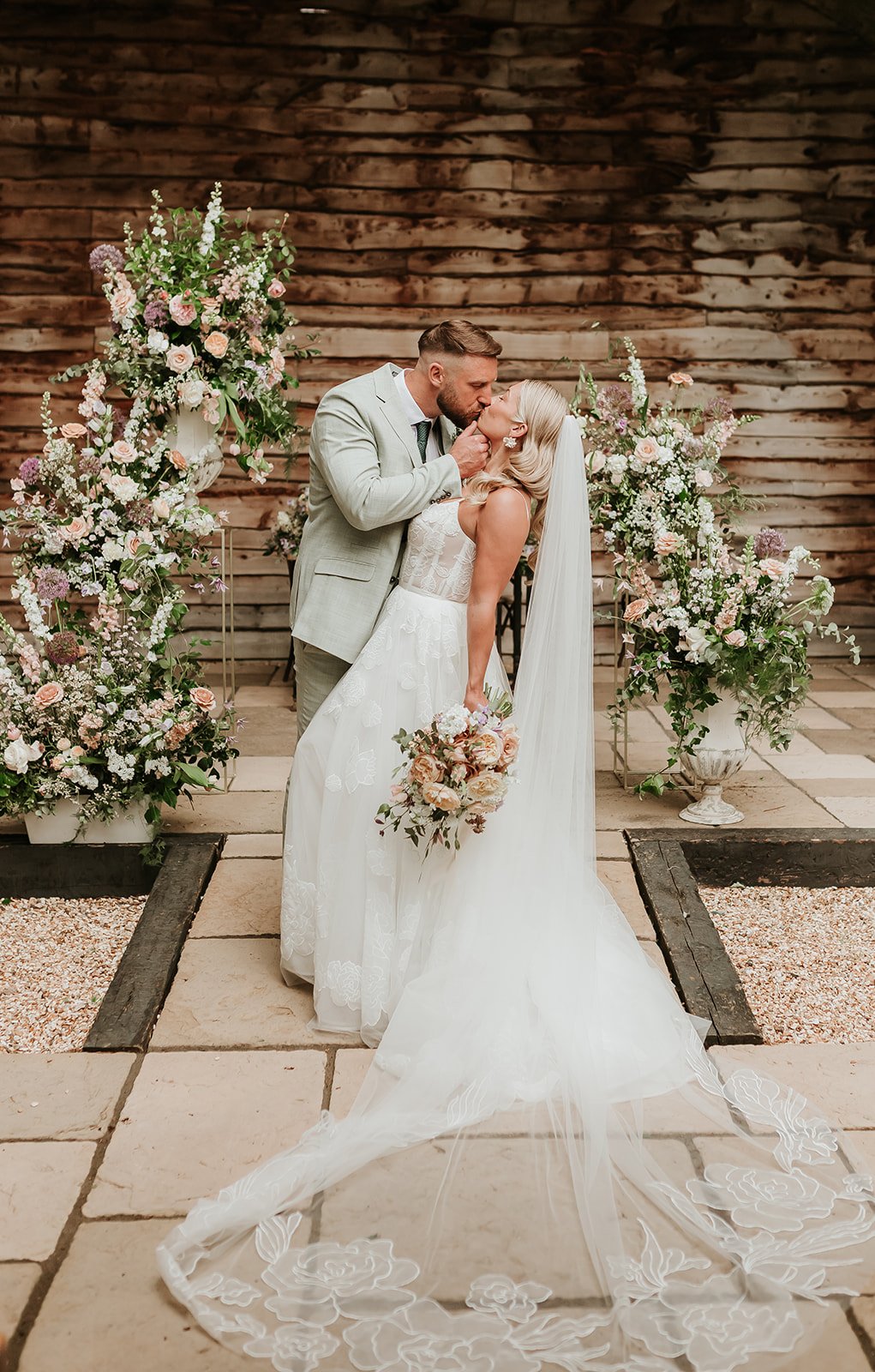 Abundant ceremony designs with pastel wedding flowers.jpeg