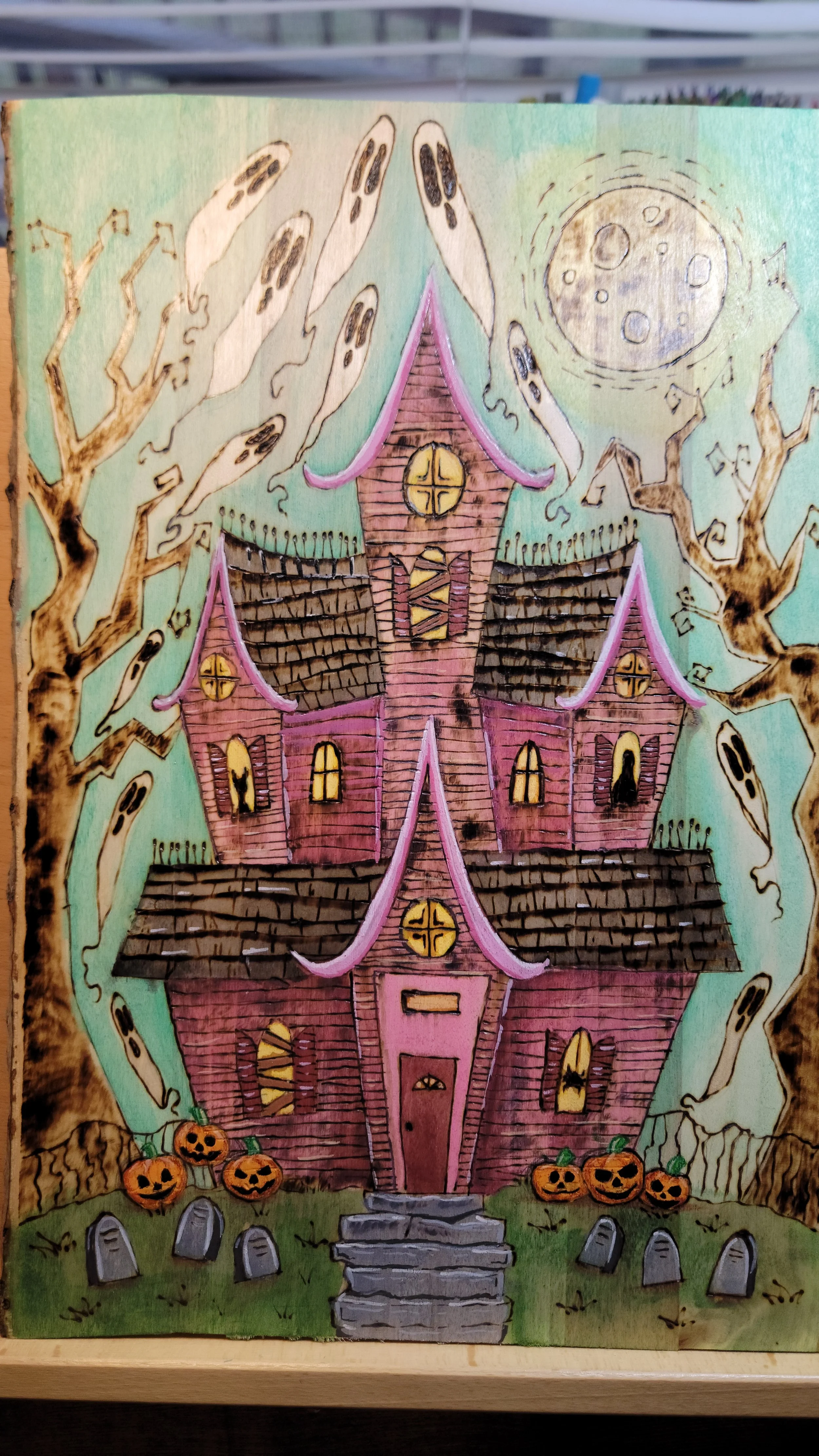 Whimsical haunted house illustration by Christy Illustrates.