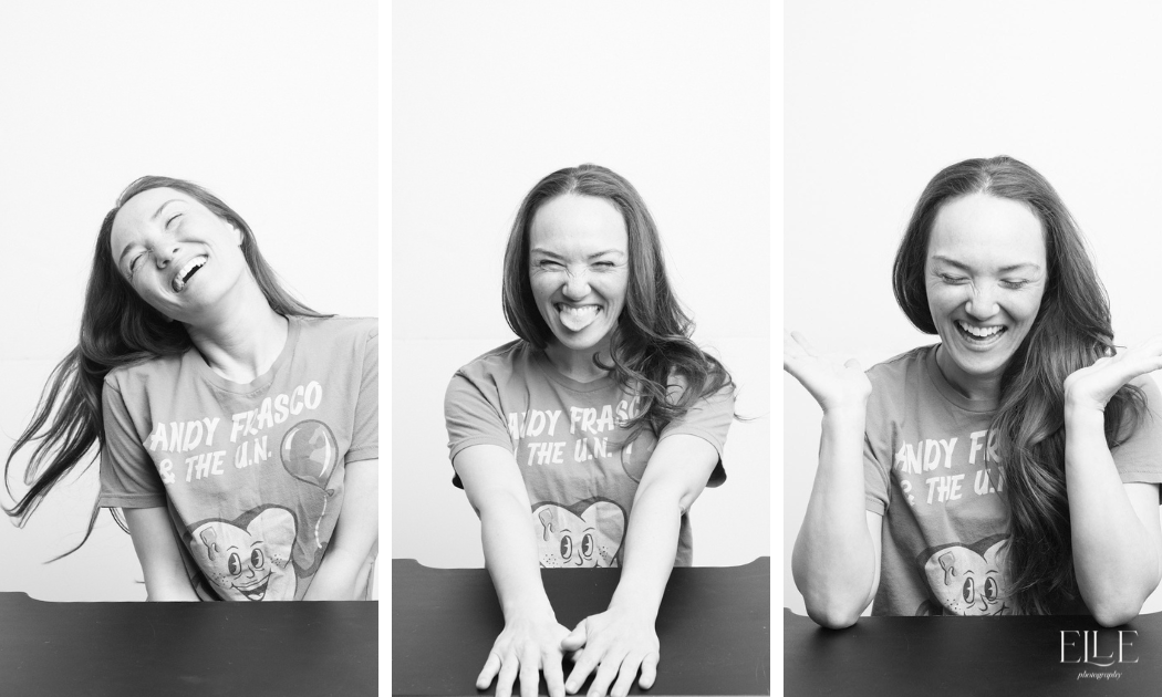 Black and white photo of a young woman with long hair in three different poses, wearing a T-shirt with a cartoon character and text, appearing joyful and playful.