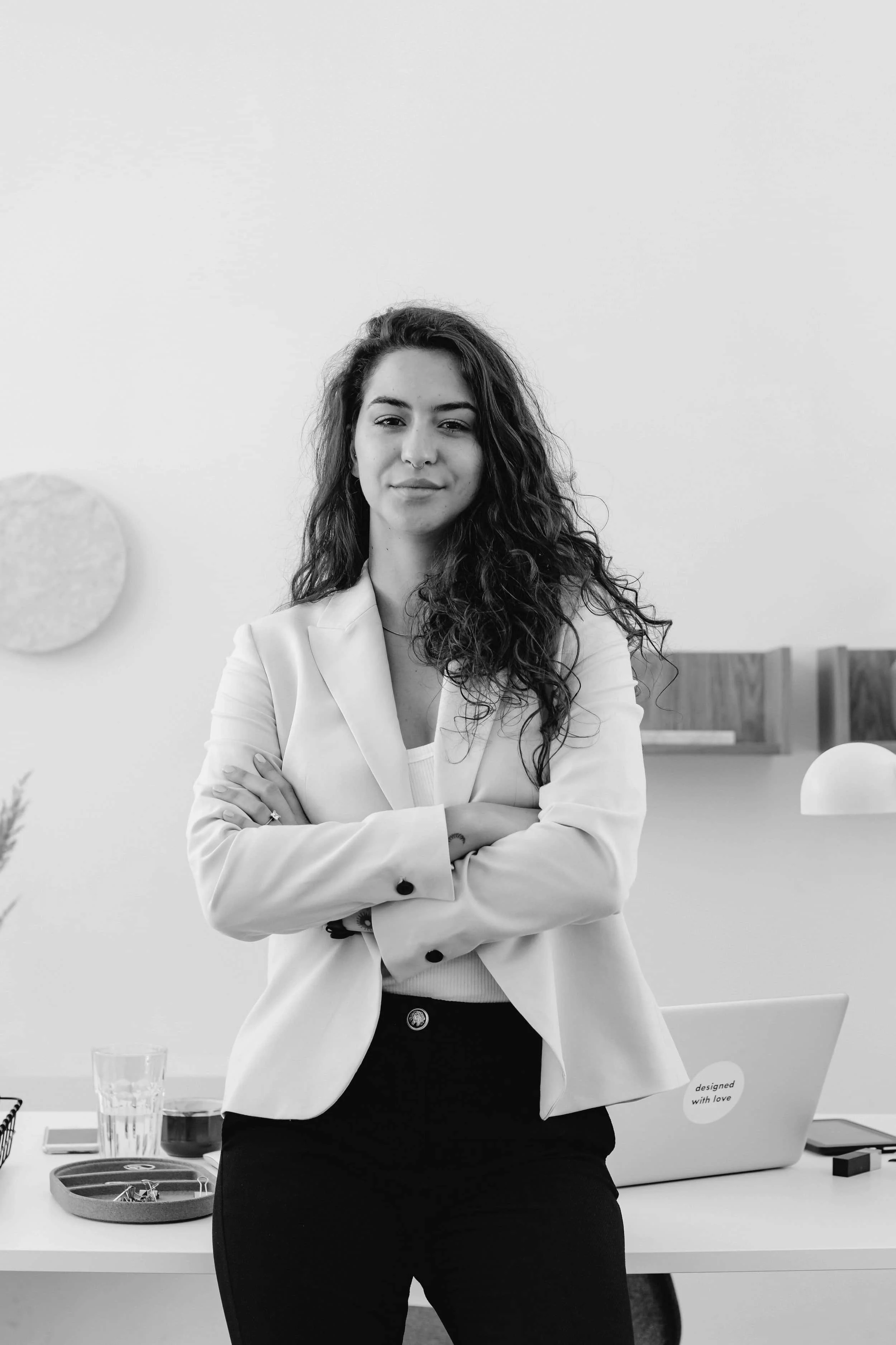 Confident Young Woman in office