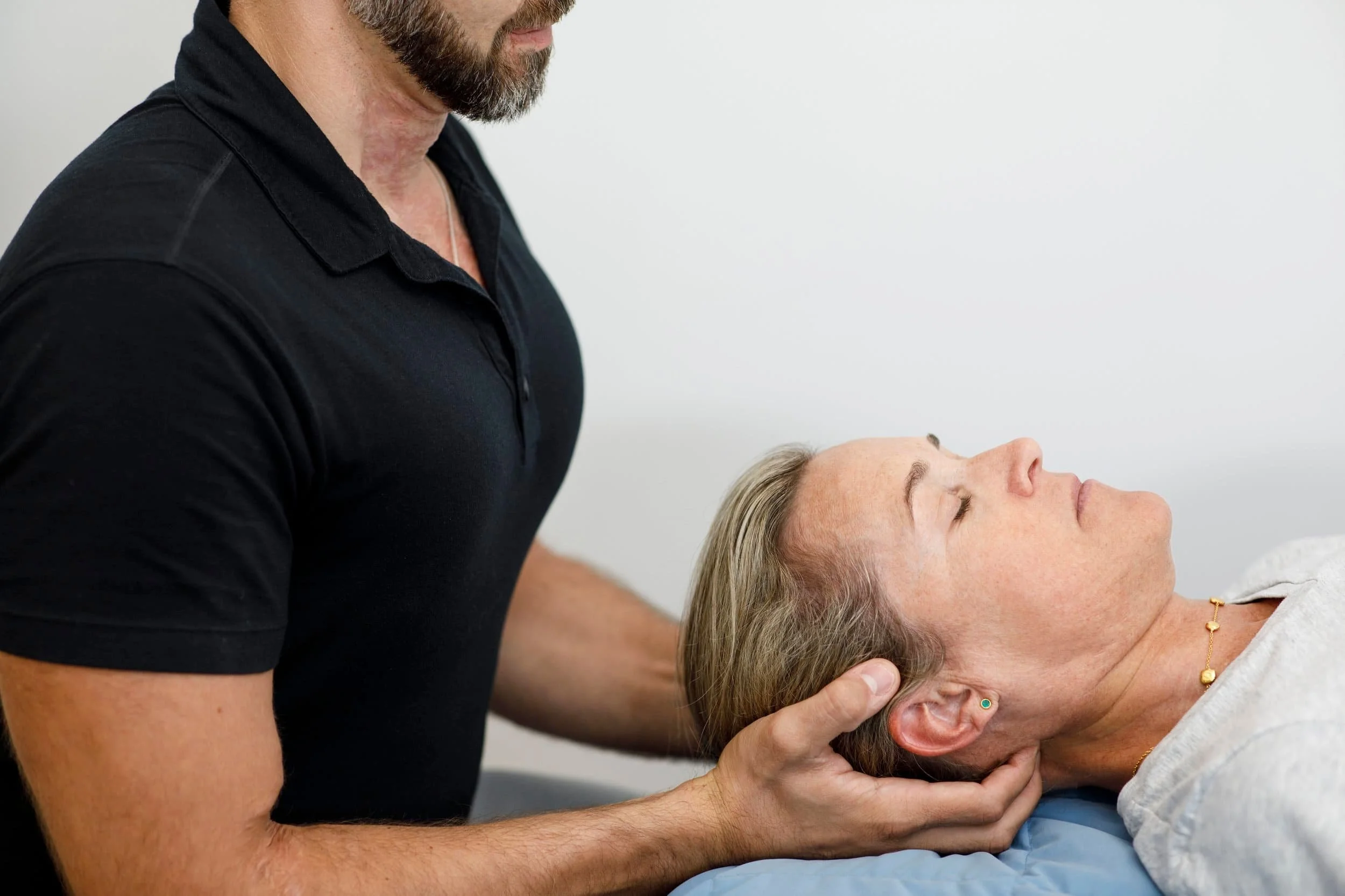 Patient receiving Cranial Sacral Therapy