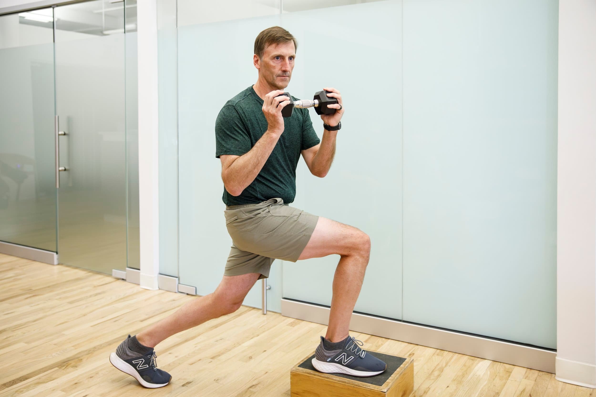 Man Training with Hand Weights
