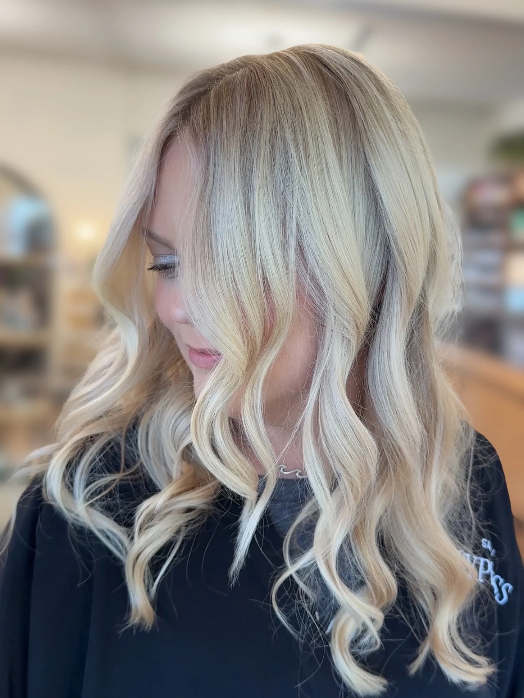 High Impact blonding is our love language. 🌊