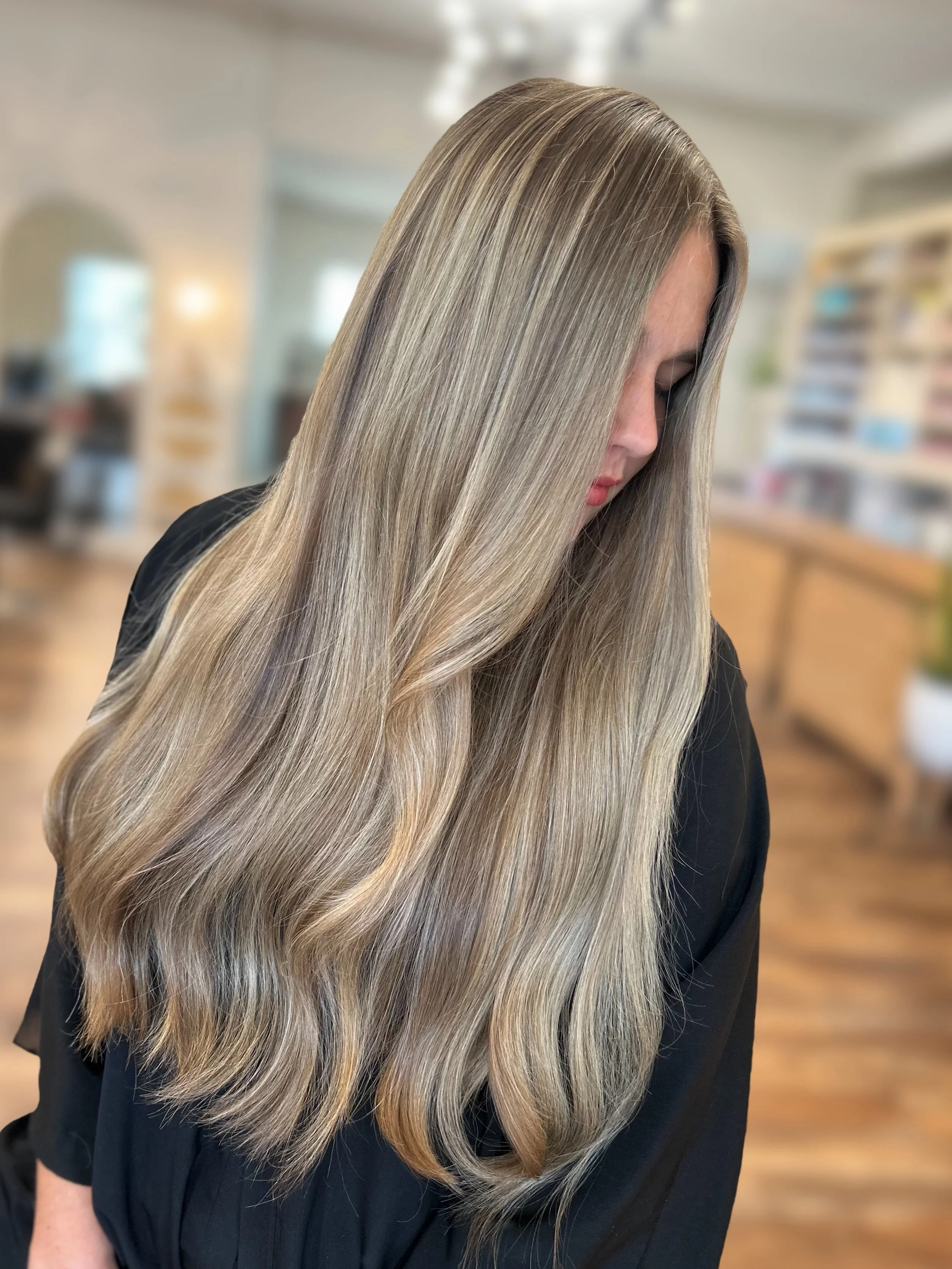 Lighter and brighter but still keeping the blonde lived-in and blendy for this gorgeous low-maintenance girlie! 🌴