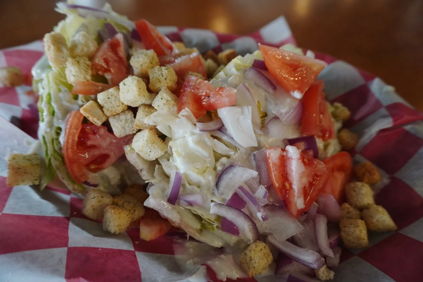 Proud members of the Wedge Salad Fan Club 🙌

blue cheese dressing | red onion | tomato | croutons | iceberg lettuce