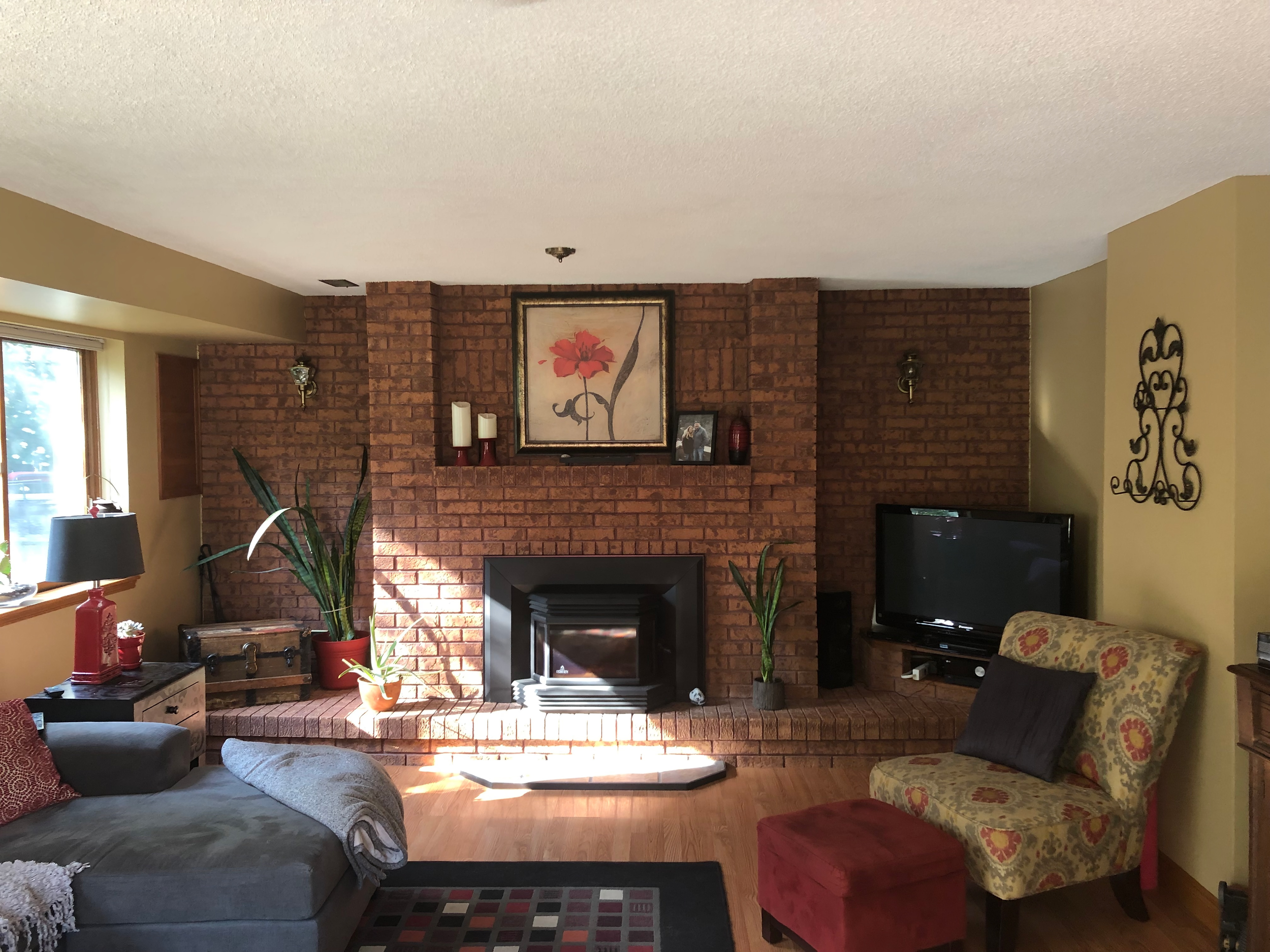 Orange Brick Fireplace Before