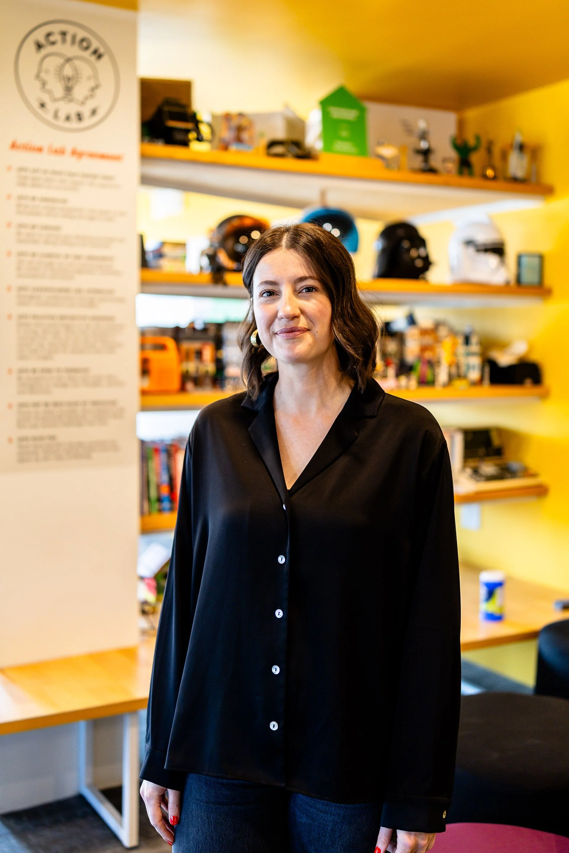 Rebecca Rubuliak — Director of Continuous Improvement and Innovation at Skills Society stands in their wonderful space.