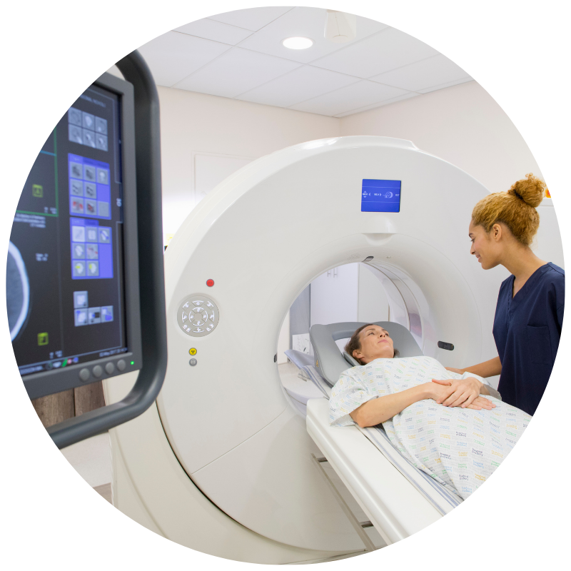 Nurse with patient in MRI machine