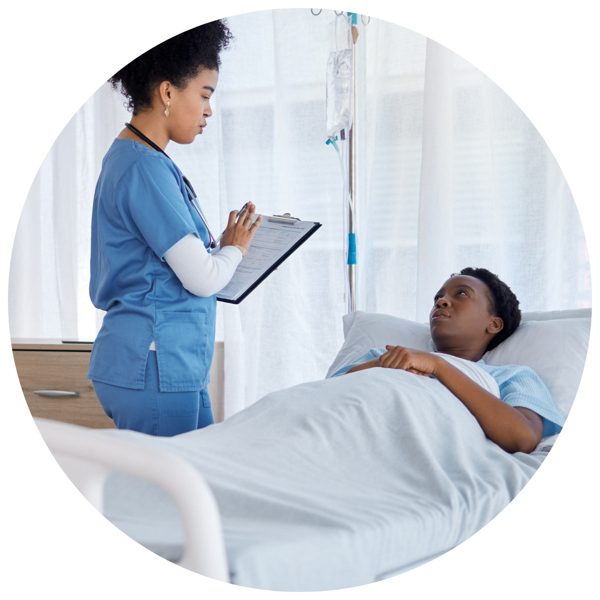 satisfied patient and efficient nurse in hospital room