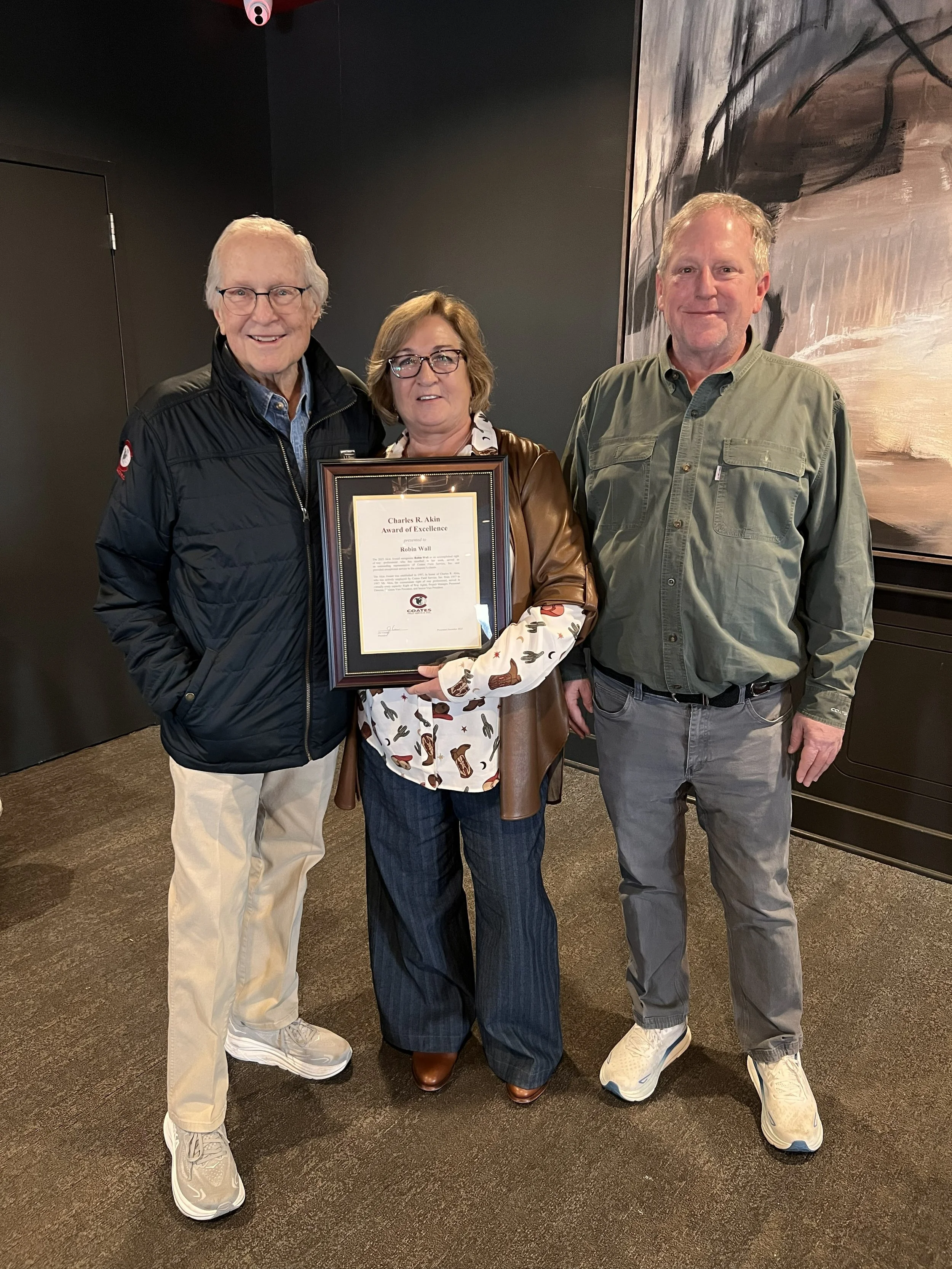 Robin Wall with John (left) and Joe Coates
