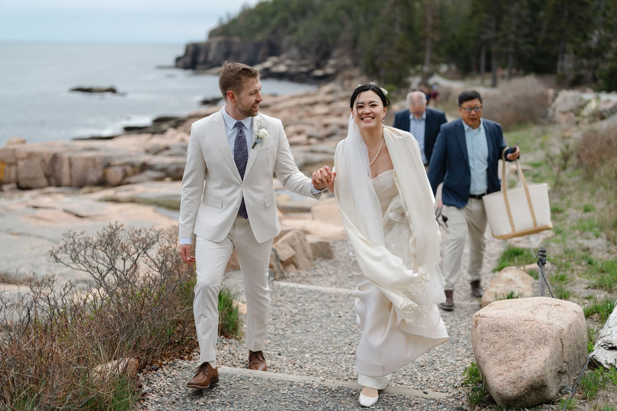 bride and groom leaving ceremony in Acadia National Park