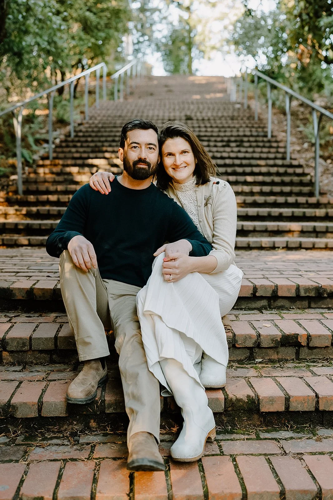 Ned and Julia Warner sitting on stairs