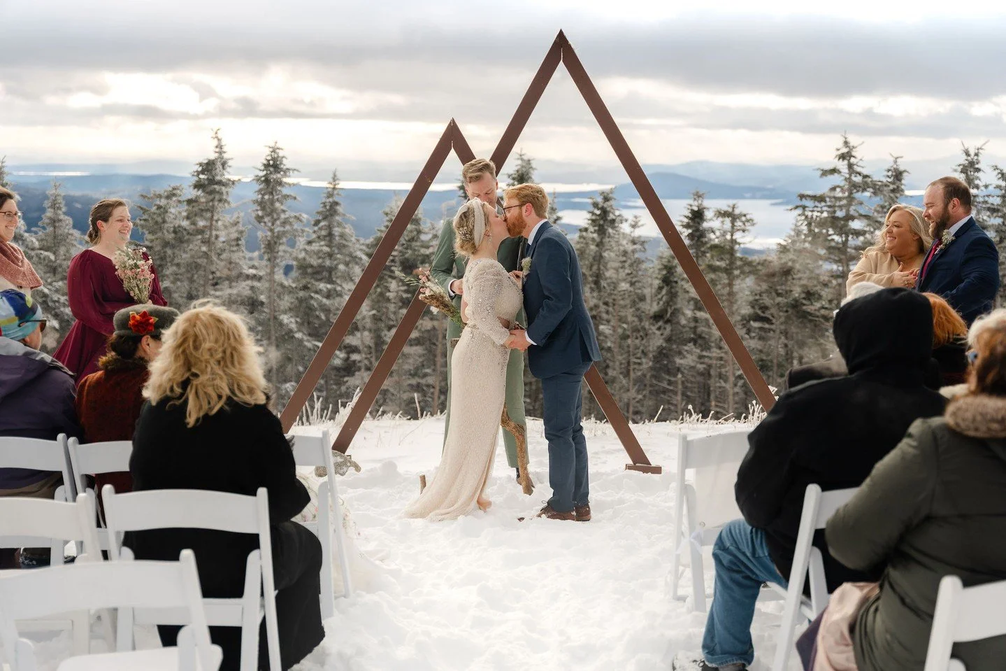 When you're big-time skiers, the answer to "where should we get married?" is pretty obvious. Dacie &amp; Connor rode the chairlift to the summit of Saddleback Mountain in Rangeley &mdash; 3,620 feet up in March, with frozen lakes stretching