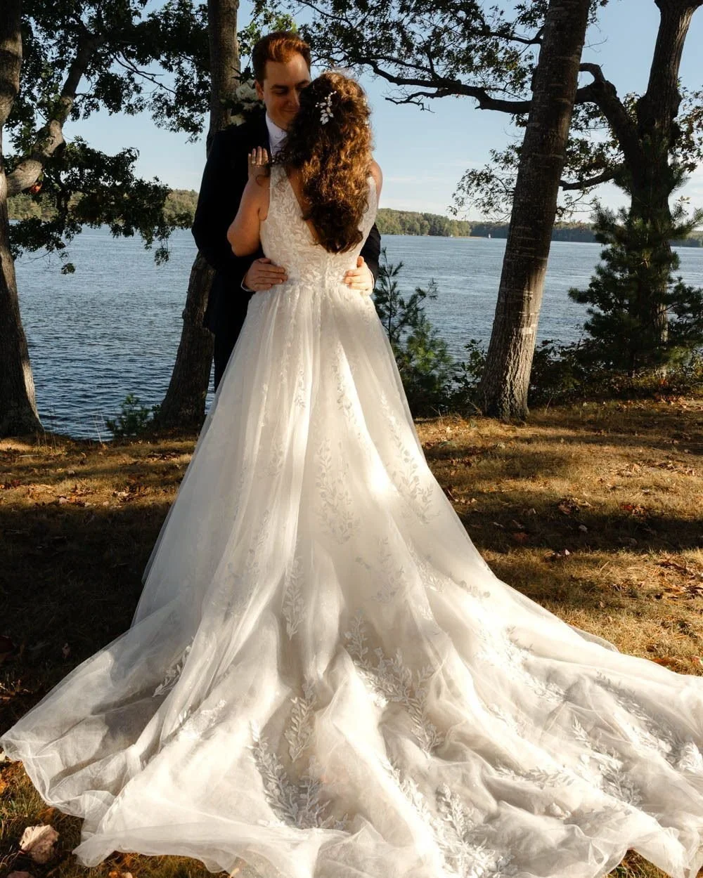 From adjusting his tie during first look to stealing a moment by the water &mdash; Eben and Becca at @mainemaritimemuseum last fall. 🤍