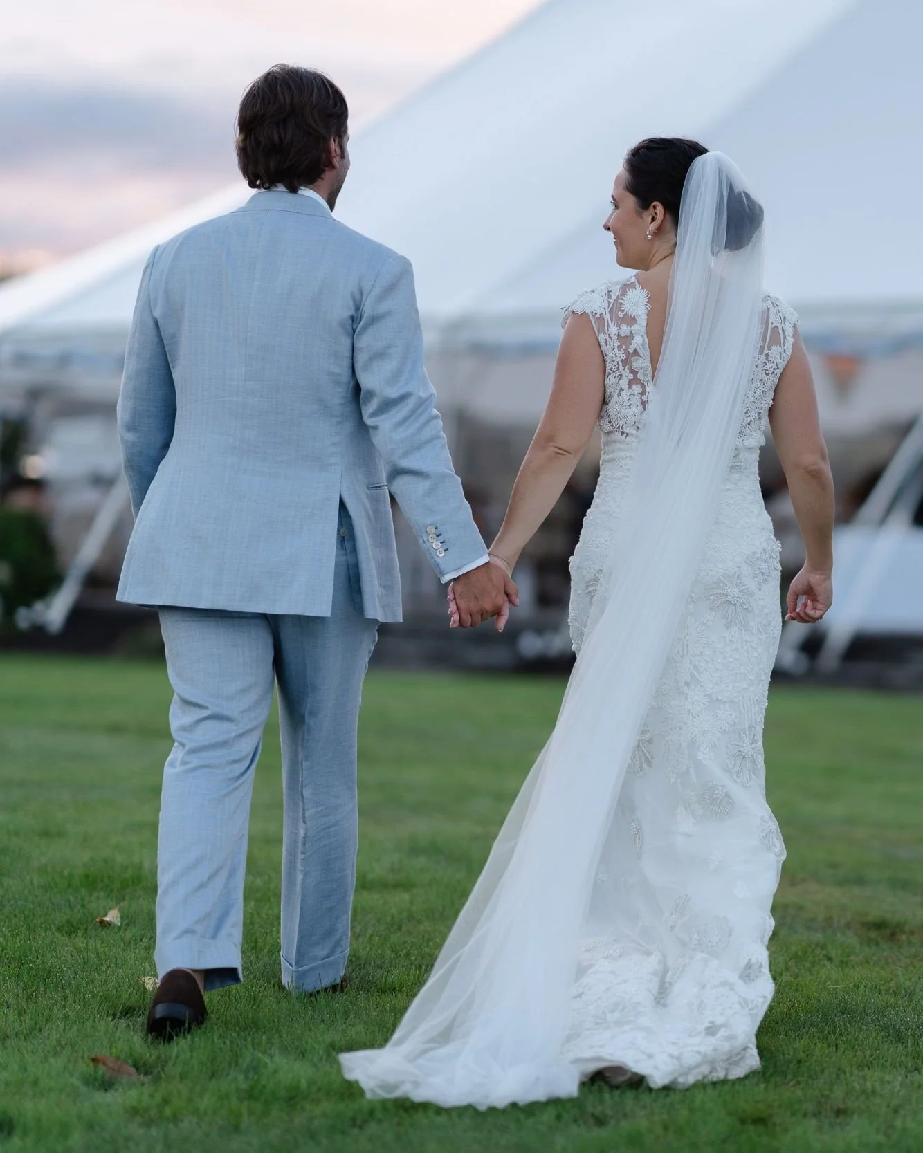 One thing we always build into a wedding timeline: golden hour portraits. Even 15 minutes away from the reception makes all the difference. The light at golden hour doesn't last, and that's exactly why we chase it.