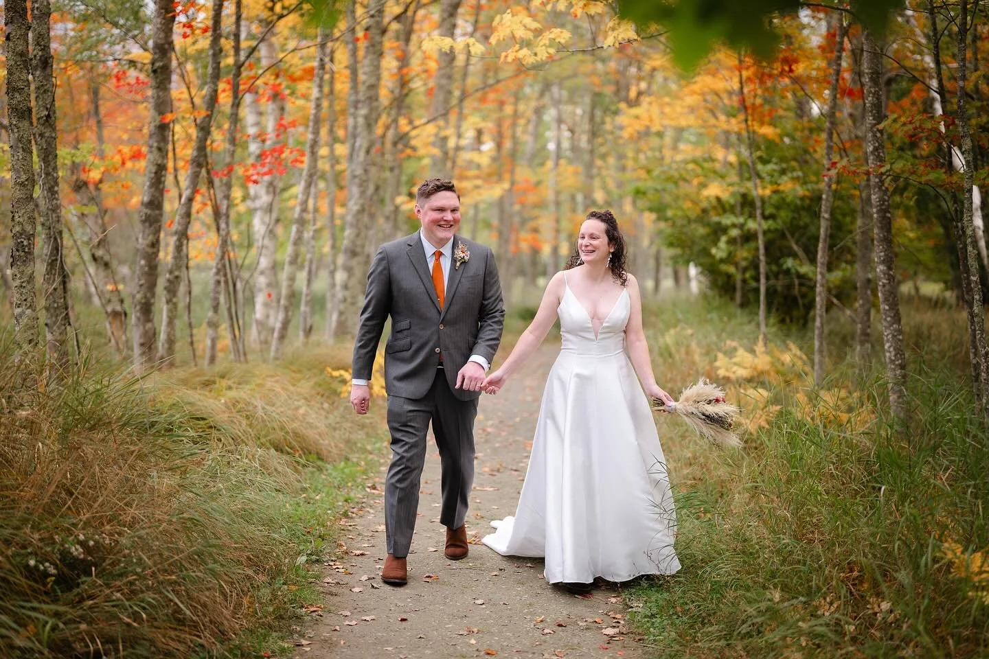 Taylor + Dillon&rsquo;s Acadia elopement was such a sweet way to start the weekend. The foliage was popping, the rain held off, and we found a private corner of the cliffs where they said their vows.

They booked us over two years ago, before they&rs