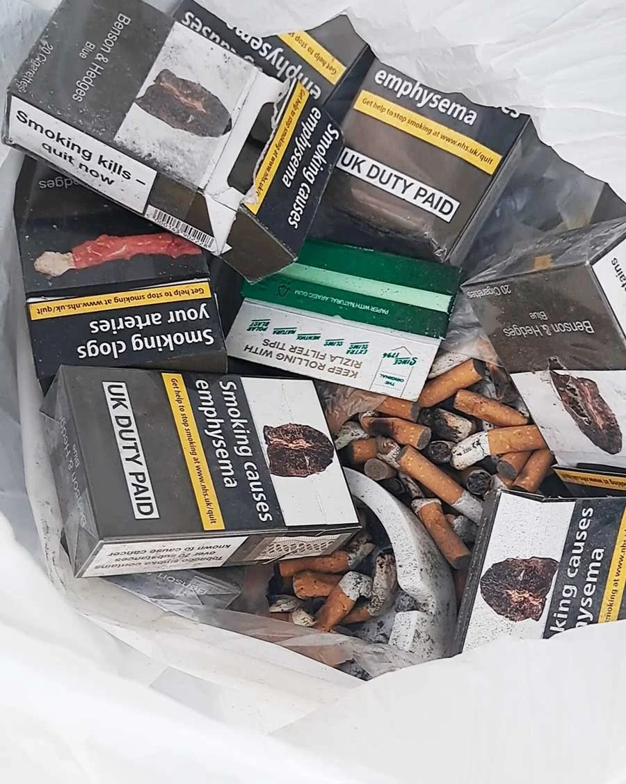 Open bag showing clients collected smoking paraphernalia