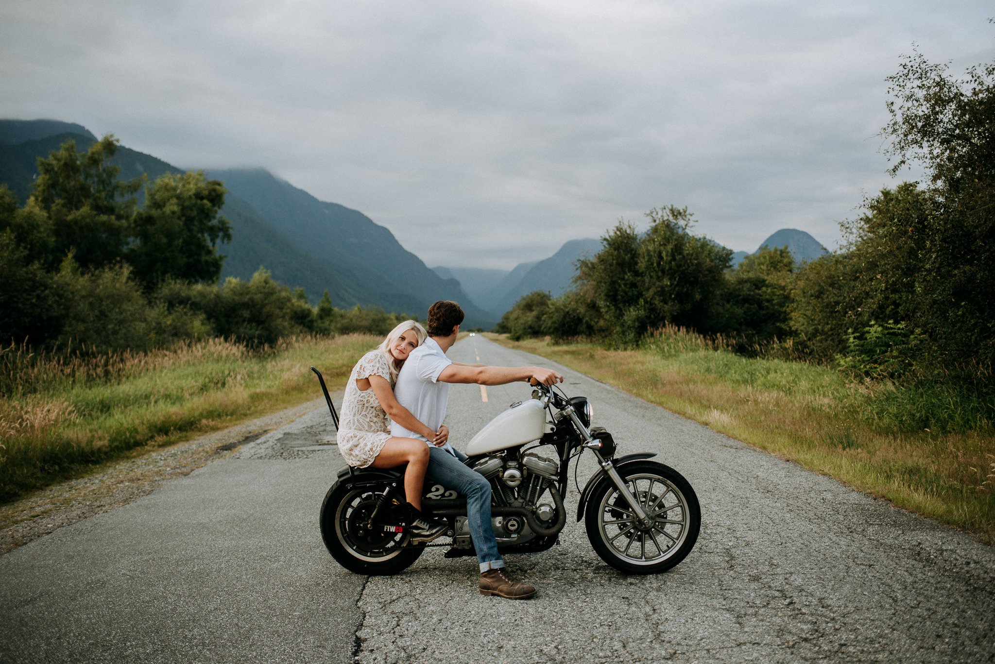 pitt lake engagement couple on motorcycle