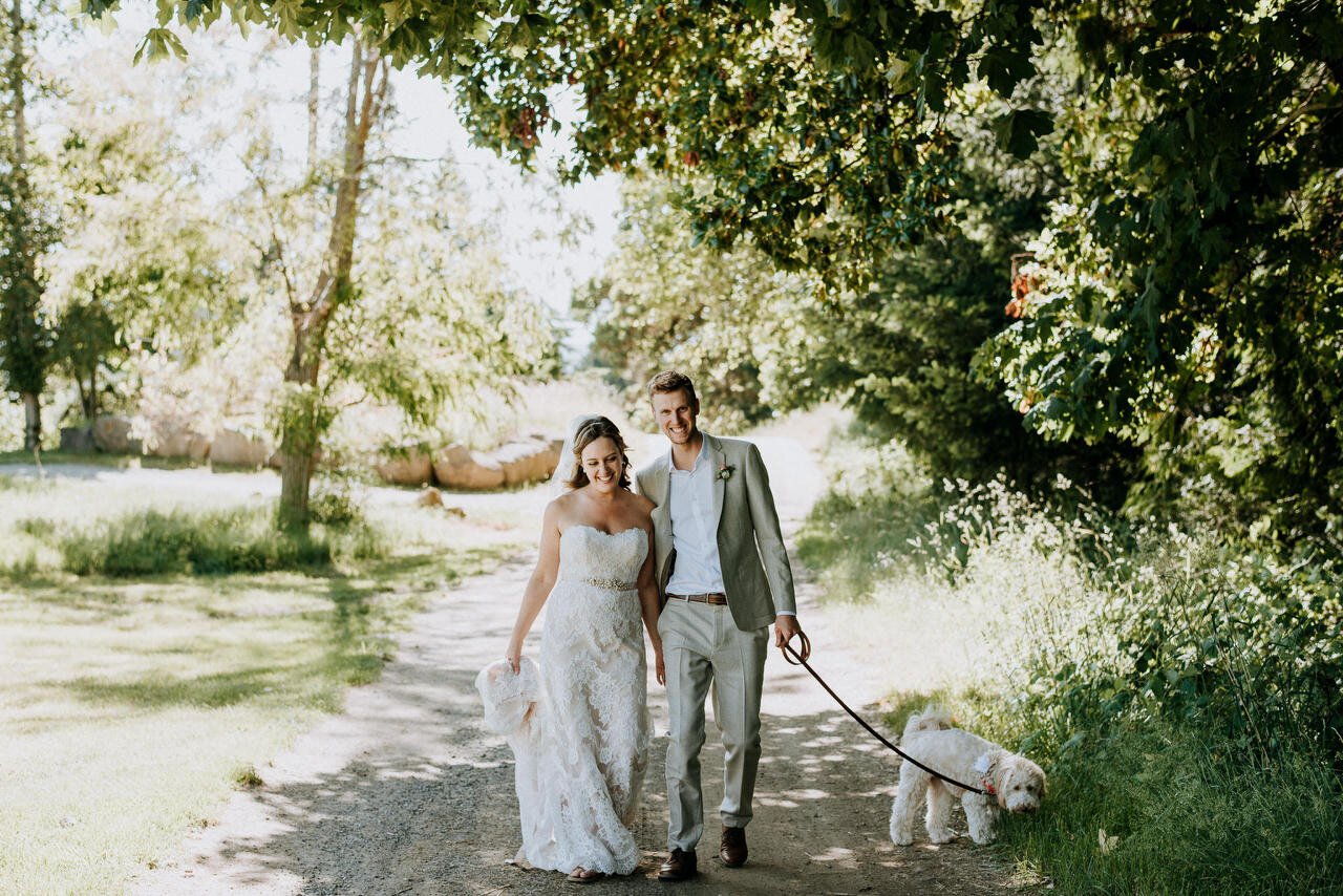 bride and groom walking dog family portrait galiano wedding